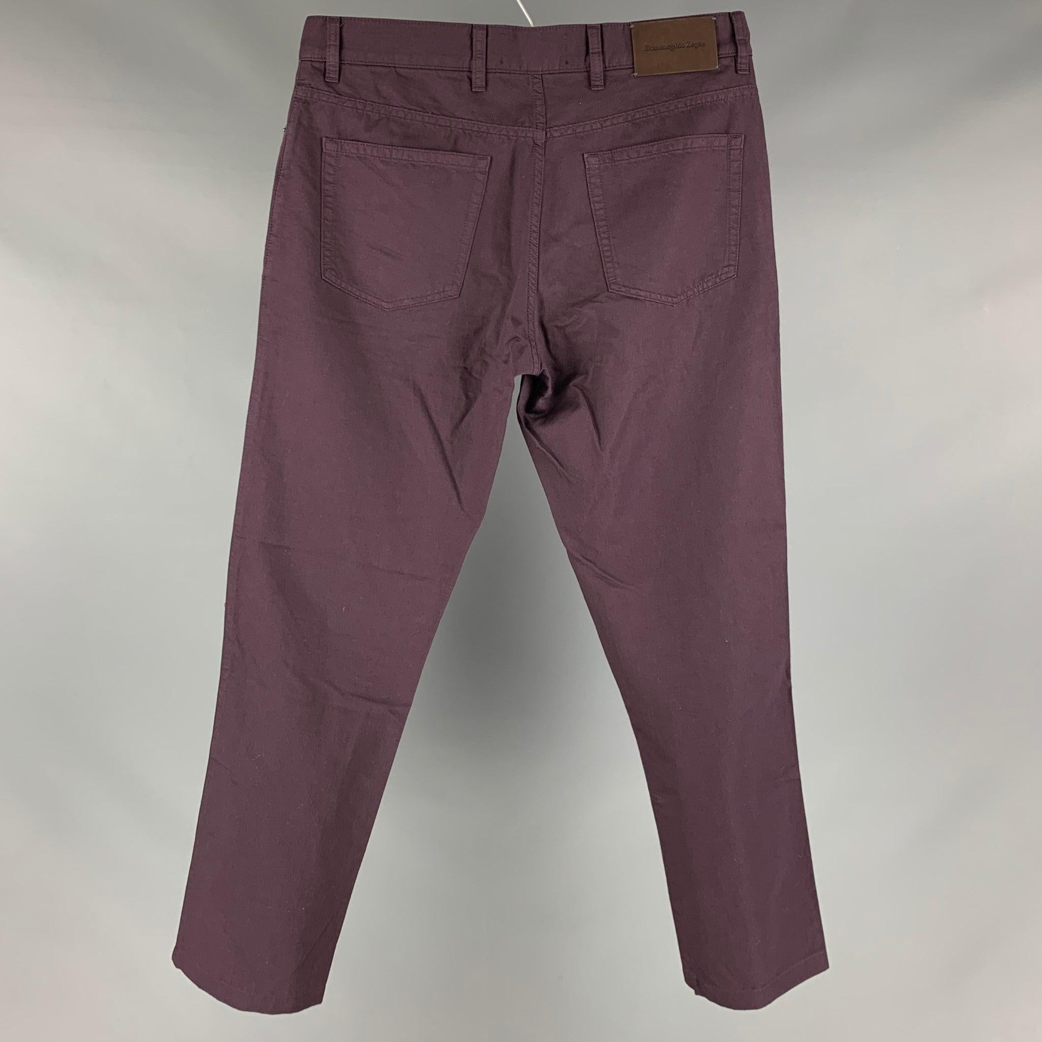 JOHN VARVATOS casual pants comes in a eggplant cotton and linen twill featuring a five pocket style, and a zip fly closure.Very Good Pre Owned Condition. 

Marked:   34  

Measurements: 
  Waist: 34 inches  Rise: 9 inches  Inseam: 28 inches  
  
  
