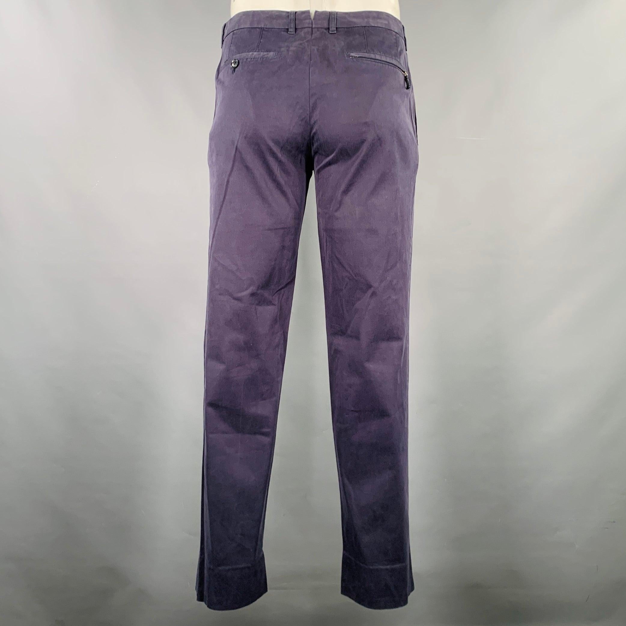 ERMENEGILDO ZEGNA casual pants in a charcoal grey cotton stretch blend fabric featuring a flat front style, straight leg, and zip fly closure. Made in Romania.Excellent Pre-Owned Condition. 

Marked:   50R 

Measurements: 
  Waist: 34 inches Rise: 8
