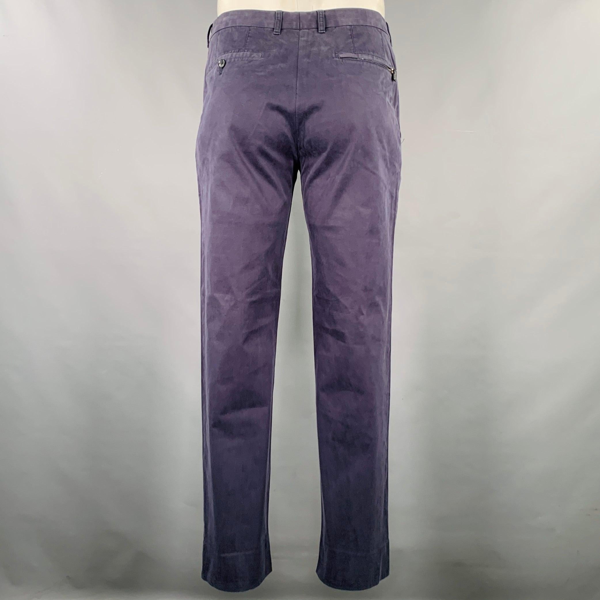 ERMENEGILDO ZEGNA casual pants in a charcoal grey cotton stretch blend fabric featuring a flat front style, straight leg, and zip fly closure. Made in Romania.Excellent Pre-Owned Condition. 

Marked:   50R 

Measurements: 
  Waist: 34 inches Rise: 8