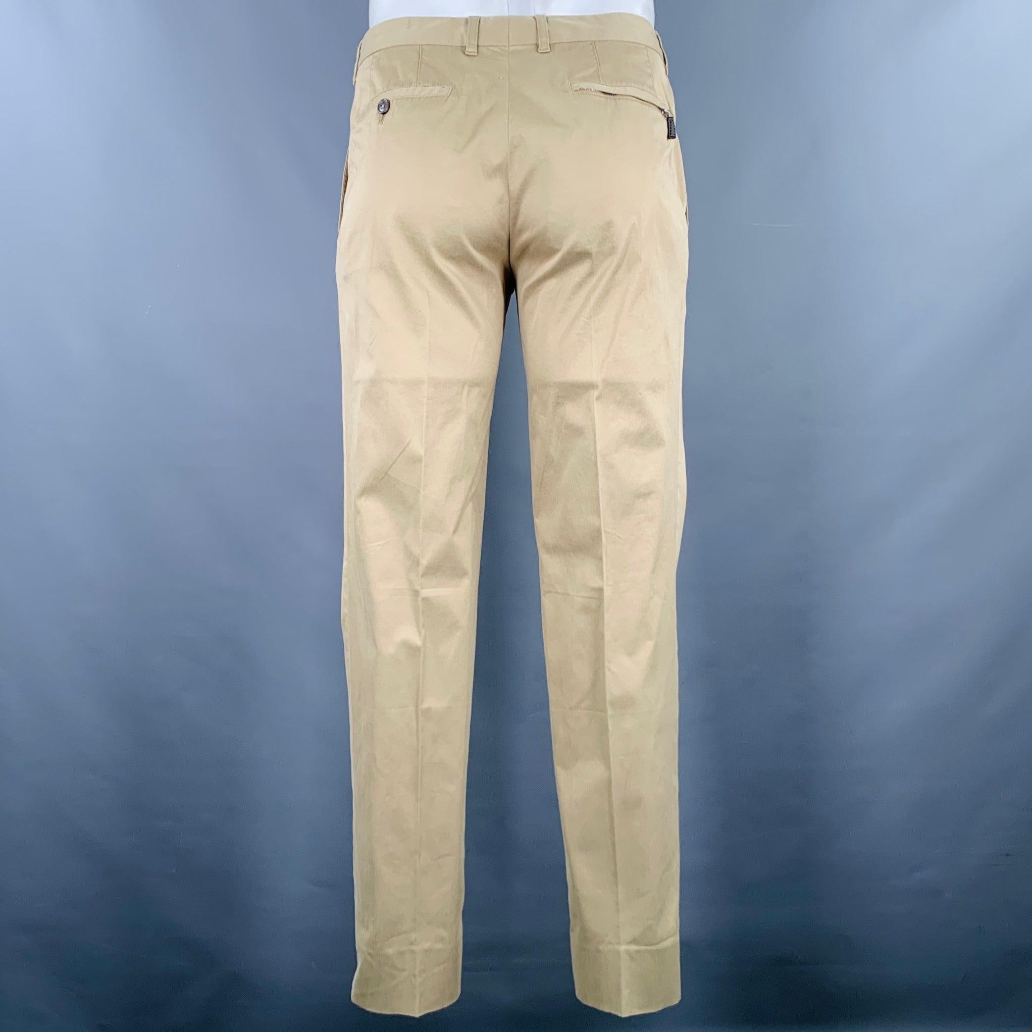 ERMENEGILDO ZEGNA casual pants
in a
tan cotton stretch blend fabric featuring a flat front style, straight leg, and zip fly closure. Made in Romania.Excellent Pre-Owned Condition. 

Marked:   50R 

Measurements: 
  Waist: 34 inches Rise: 8 inches