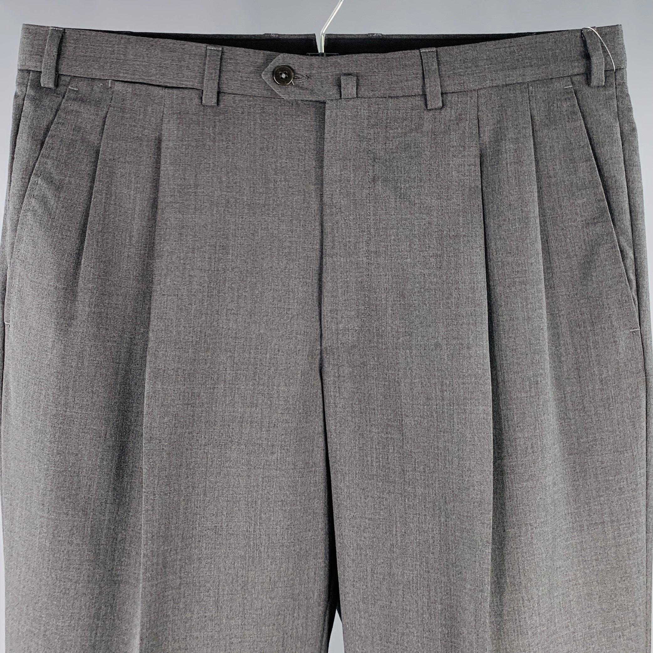 ERMENEGILDO ZEGNA dress pants
in a grey wool featuring a pleated style, cuffed design, and zip fly closure. Made in Portugal.Excellent Pre-Owned Condition. 

Marked:   36R 

Measurements: 
  Waist: 36 inches Rise: 10.25 inches Inseam: 28 inches 
  
