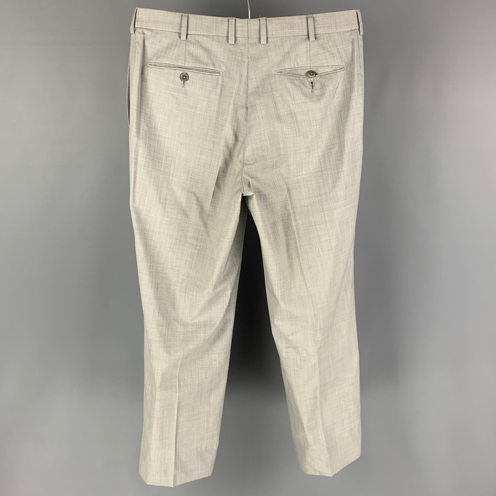 ERMENEGILDO ZEGNA pants comes in a light grey wool 
featuring a flat front and a zip fly closure.
Good
Pre-Owned Condition. Light discoloration at front. As-is. 

Marked:  36 R 

Measurements: 
 Waist: 34 inches Rise: 11 inches Inseam: 28 inches Leg