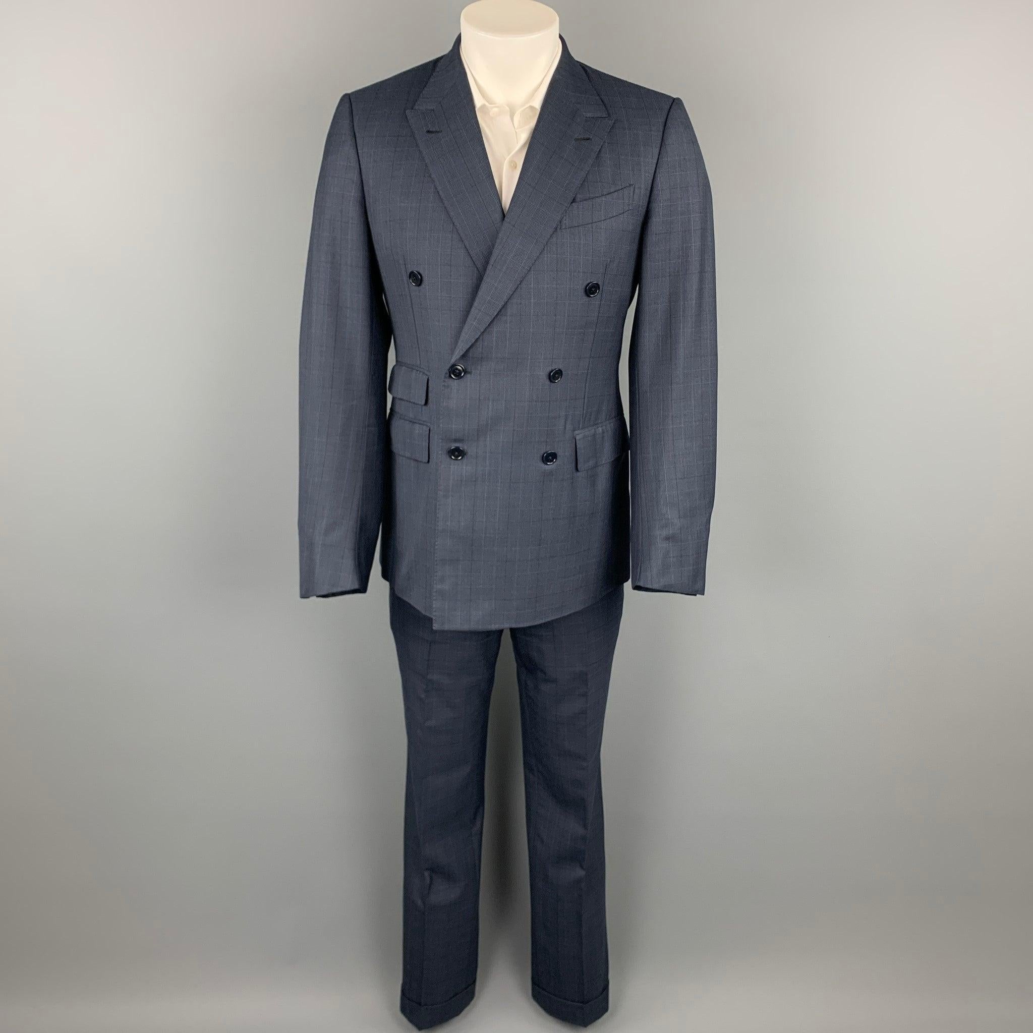 ERMENEGILDO ZEGNA custom
suit comes in a navy glenplaid wool / silk with a full liner and includes a double breasted sport coat with a peak lapel and matching flat front trousers. Very Good Pre-Owned Condition. 

Marked:   50 

Measurements: 
 