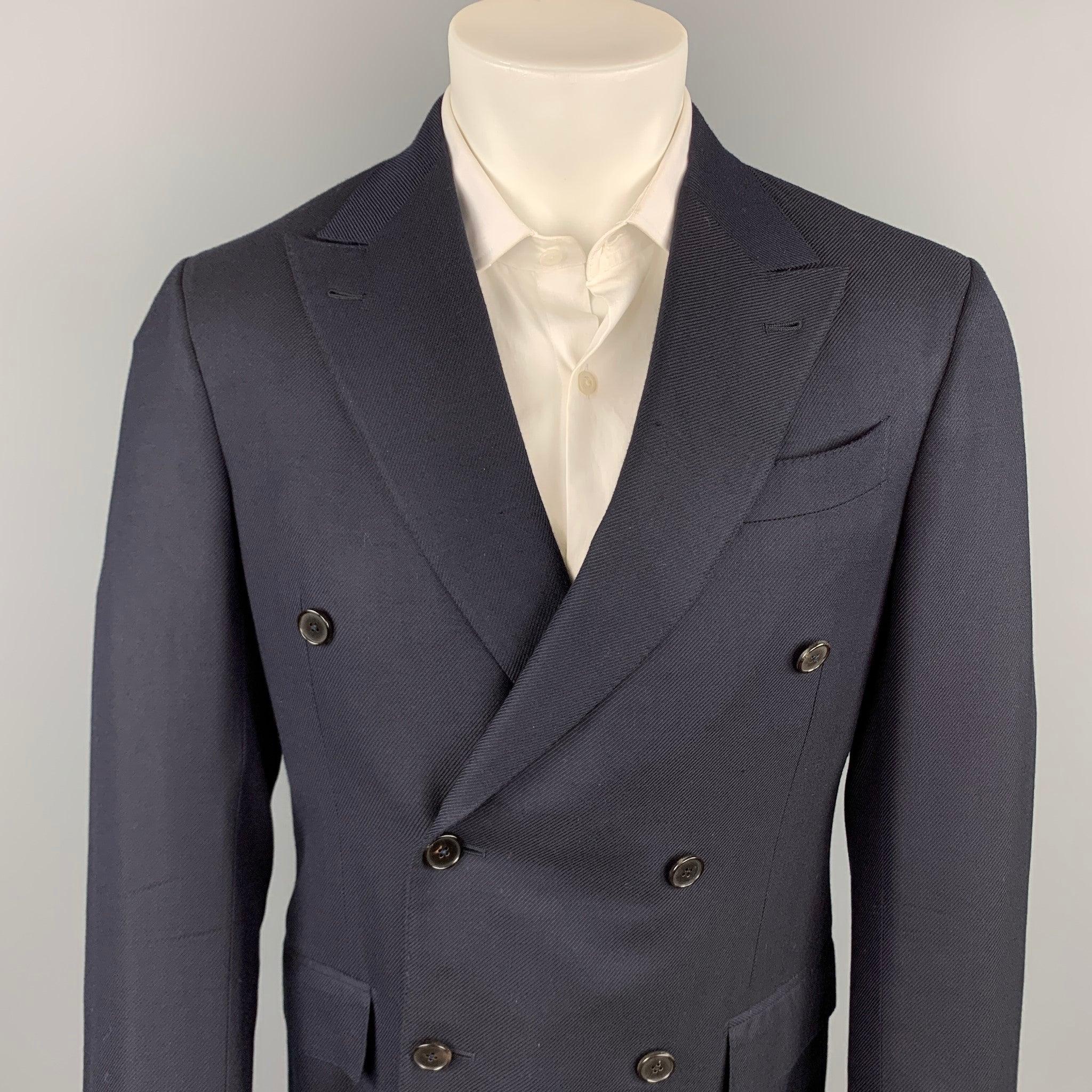 ERMENEGILDO ZEGNA custom sport coat comes in a navy silk / wool with a full liner featuring a peak lapel, flap pockets, and a double breasted closure. Made in Italy.
Very Good
Pre-Owned Condition. 

Marked:   50 R 

Measurements: 
 
Shoulder: 17.5