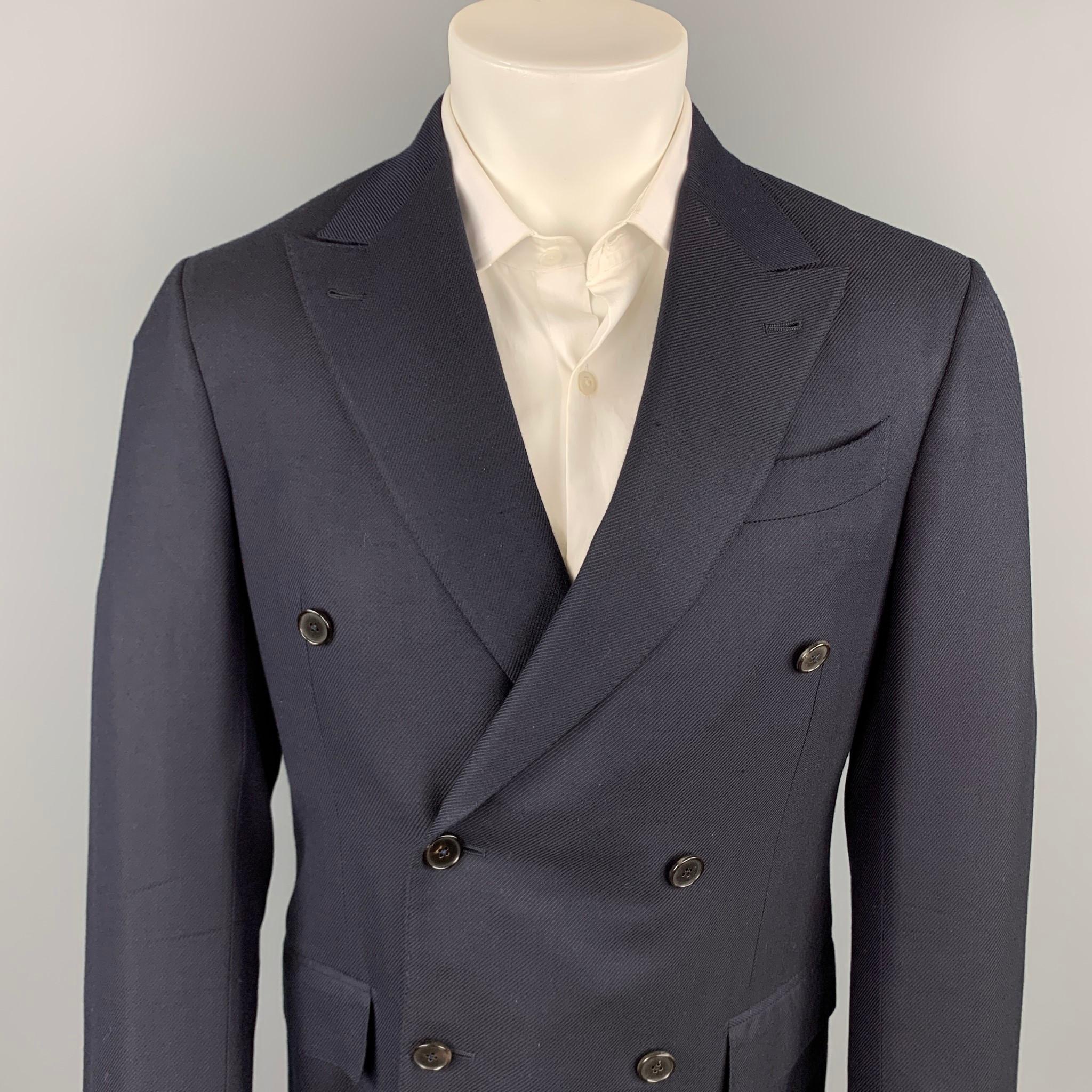 ERMENEGILDO ZEGNA custom sport coat comes in a navy silk / wool with a full liner featuring a peak lapel, flap pockets, and a double breasted closure. Made in Italy.

Very Good Pre-Owned Condition.
Marked: 50 R

Measurements:

Shoulder: 17.5
