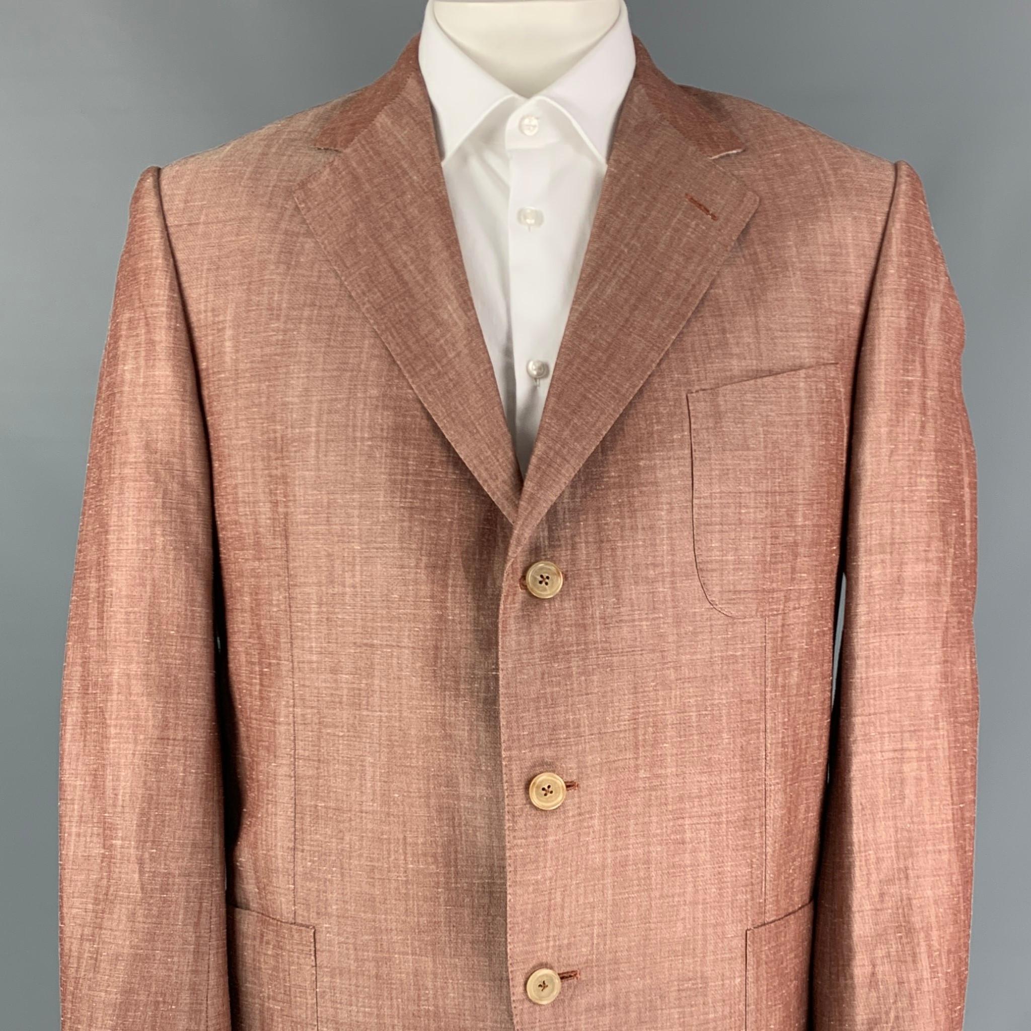 ERMENEGILDO ZEGNA sport coat comes in a brick & cream wool blend with a half liner featuring a notch lapel, double back vent, patch pockets, and a three button closure 

Very Good Pre-Owned Condition.
Marked: 54 R

Measurements:

Shoulder: 19
