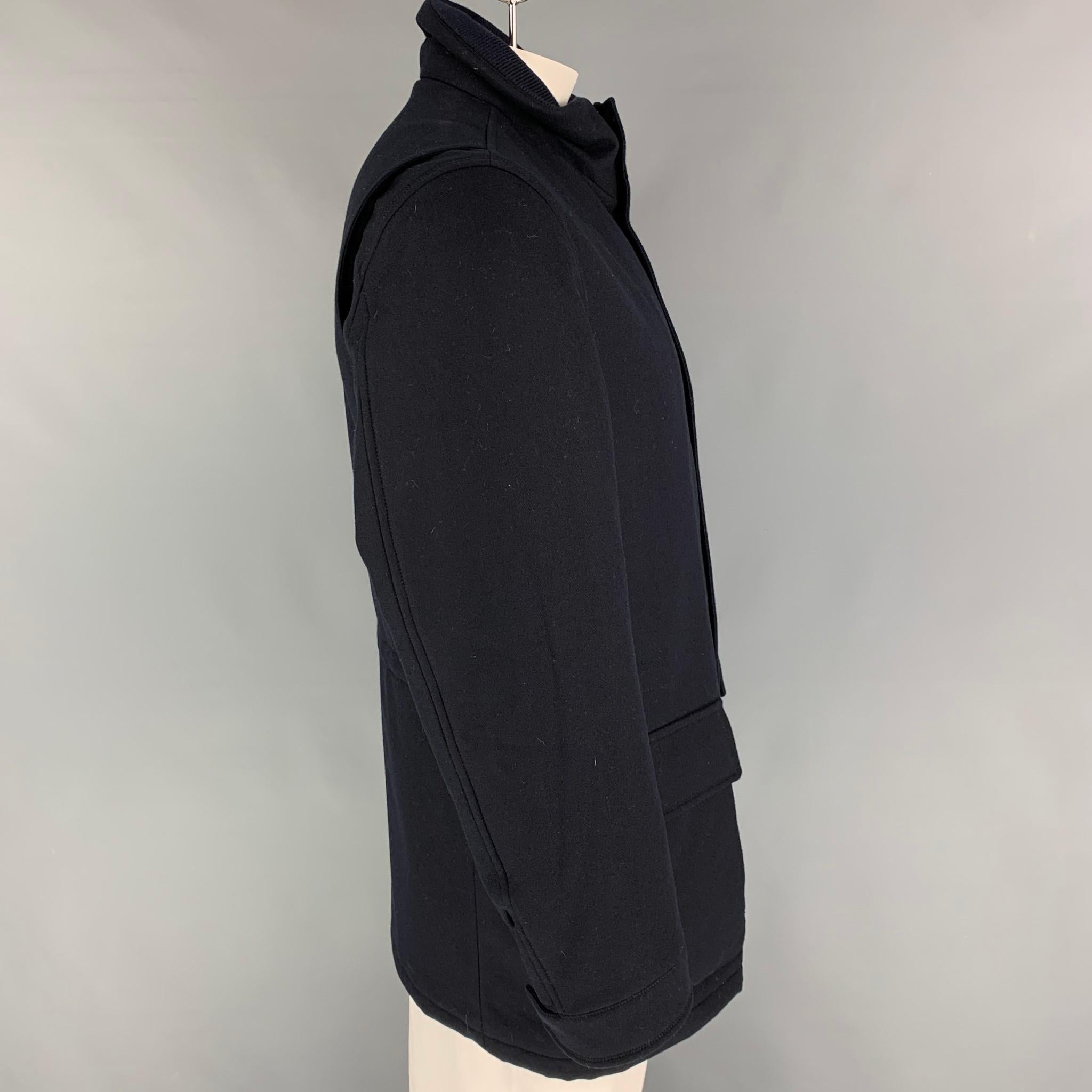 ERMENEGILDO ZEGNA jacket comes in black wool / cashmere featuring a high collar, patch pockets, and a hidden zip & snap button closure. Made in Italy. 

New With Tags. 
Marked: 48 R
Original Retail Price: $3,395.00

Measurements:

Shoulder: 19
