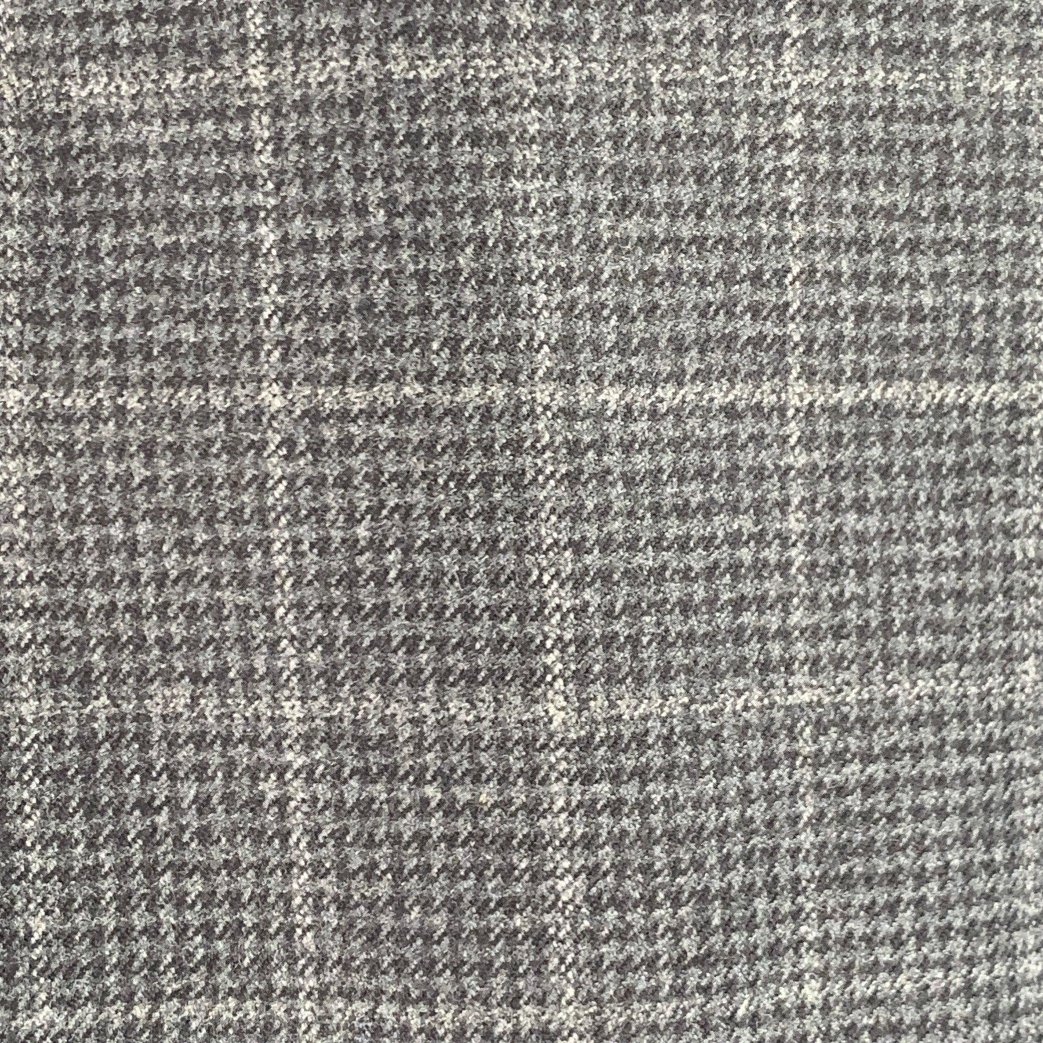 ERMENEGILDO ZEGNA Sportmantel
aus anthrazitfarbener und grauer Wolle mit Hahnentrittmuster, Revers mit Kerbe, doppeltem Rückenschlitz und Drei-Knopf-Verschluss. Made in Switzerland Ausgezeichneter Pre-Owned Zustand. 

Markiert:   IT 58L