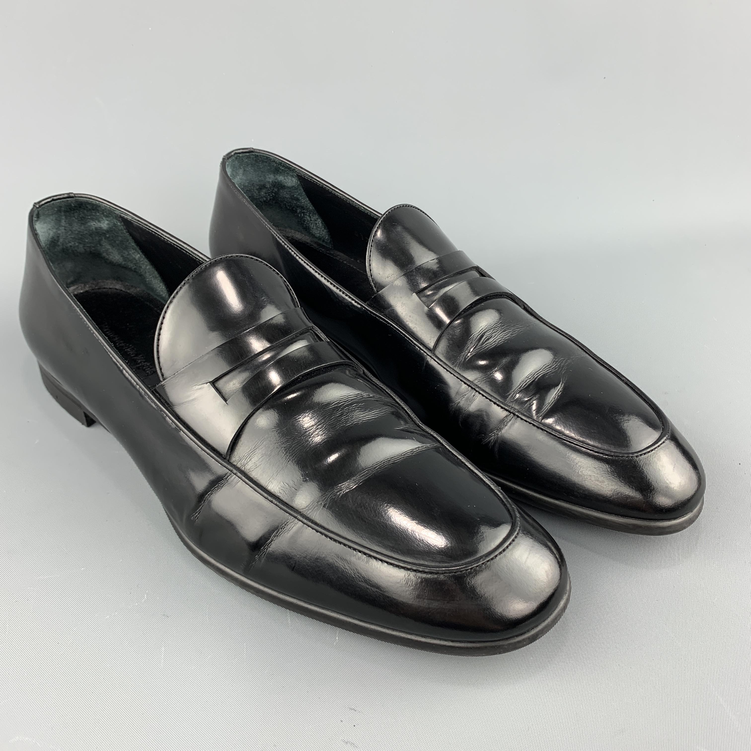 ERMENEGILDO ZEGNA loafers come in black patent leather with an apron toe, penny strap and rubber sole. With box. Made in Italy.
 
Good Pre-Owned Condition.
Marked: 9.5
 
Outsole: 12.25 x 4 in.