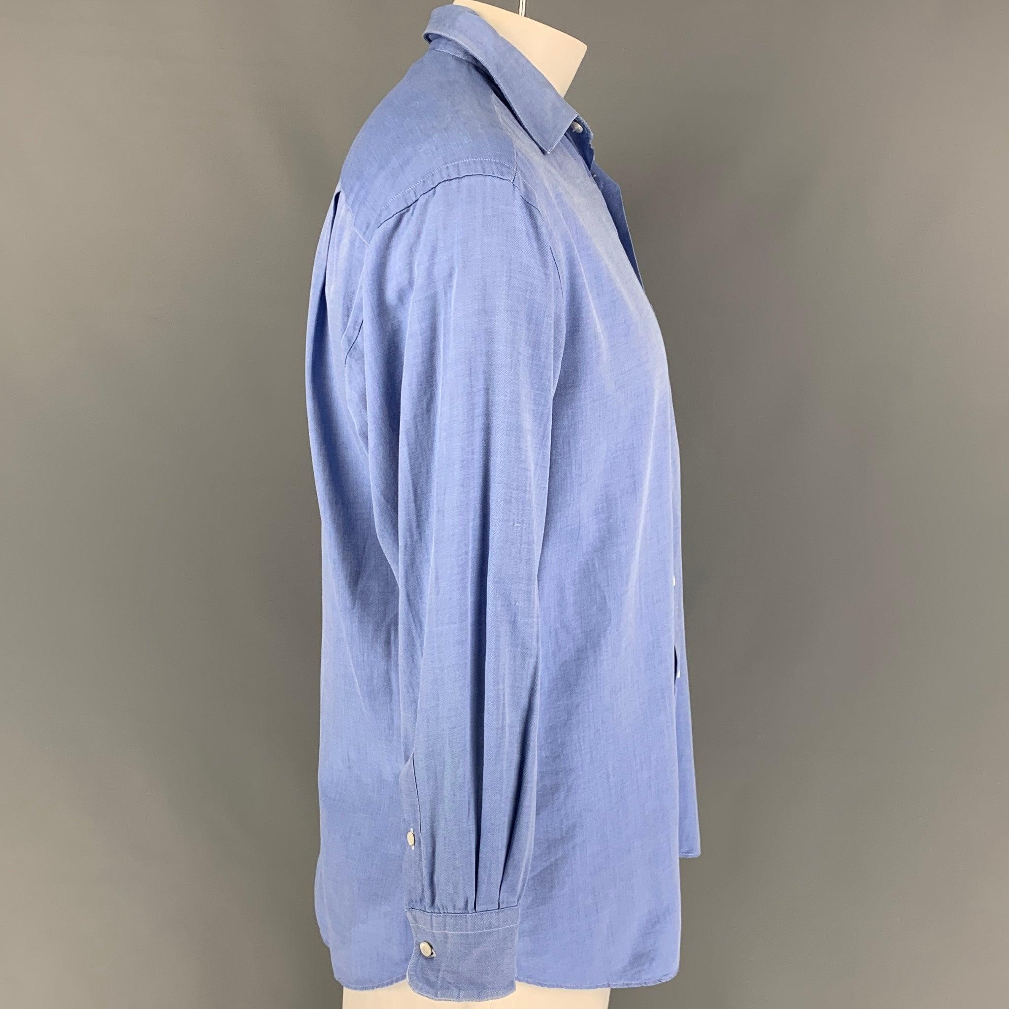 ERMENEGILDO ZEGNA long sleeve shirt comes in a blue cotton featuring a spread collar, front pocket, and a button up closure. Made in USA.
Very Good
Pre-Owned Condition. 

Marked:   41/16 

Measurements: 
 
Shoulder: 20 inches  Chest: 48 inches