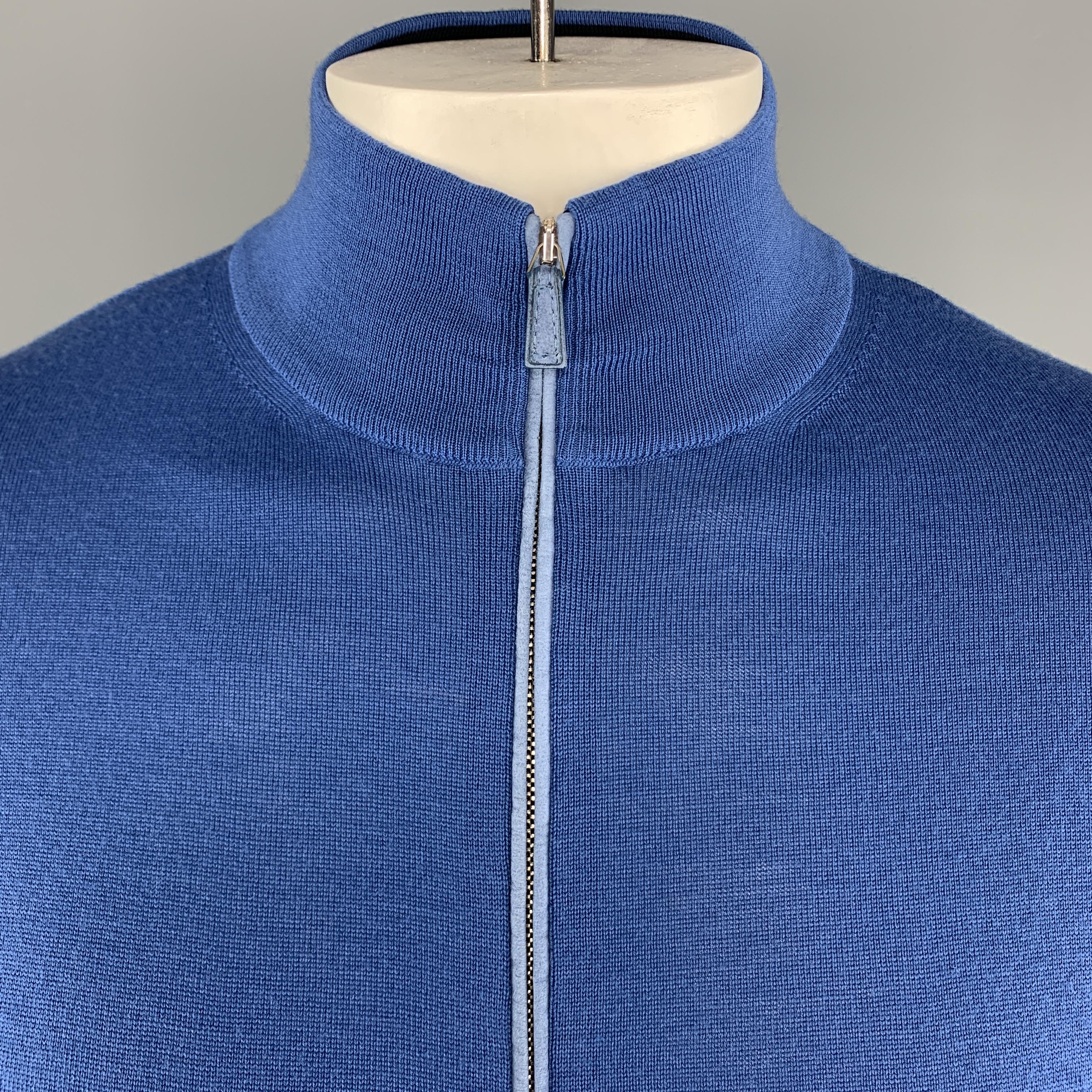 ERMENEGILDO ZEGNA Pullover Sweater comes in a blue tone in a solid wool / cashmere material, with a high collar, zipped front, long sleeves and ribbed cuffs and hem. Made in Italy.
 
Excellent Pre-Owned Condition.
Marked: L
 
Measurements:
