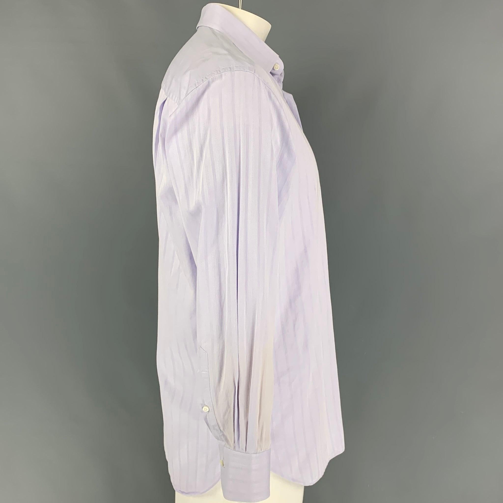 ERMENEGILDO ZEGNA long sleeve shirt comes in a purple cotton featuring a spread collar, front pocket, and a button up closure.
Very Good
Pre-Owned Condition. 

Marked:   41/16 

Measurements: 
 
Shoulder: 19 inches  Chest: 44 inches  Sleeve: 24