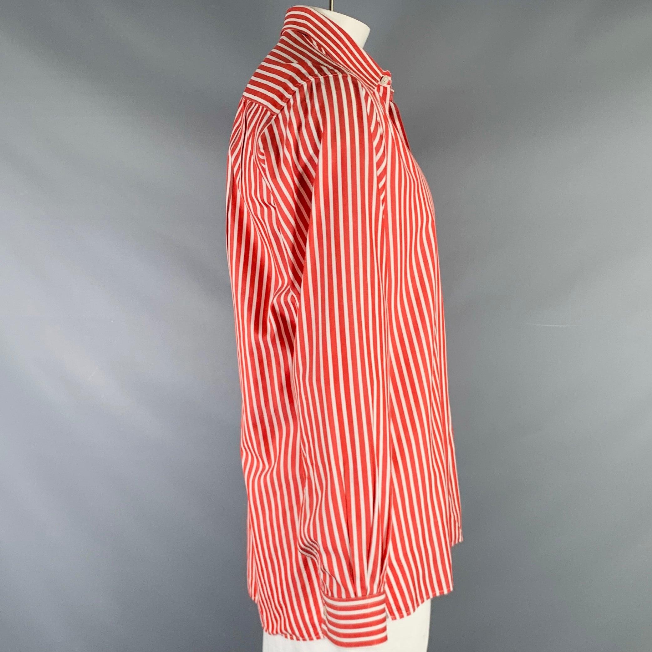 ERMENEGILDO ZEGNA
camicia a maniche lunghe in tessuto di cotone rosso e bianco con motivo a righe, colletto curvo, un taschino, colletto con bottoni nascosti e chiusura con bottoni. Made in Romania.Eccellente condizione di usato. 

Contrassegnato:  