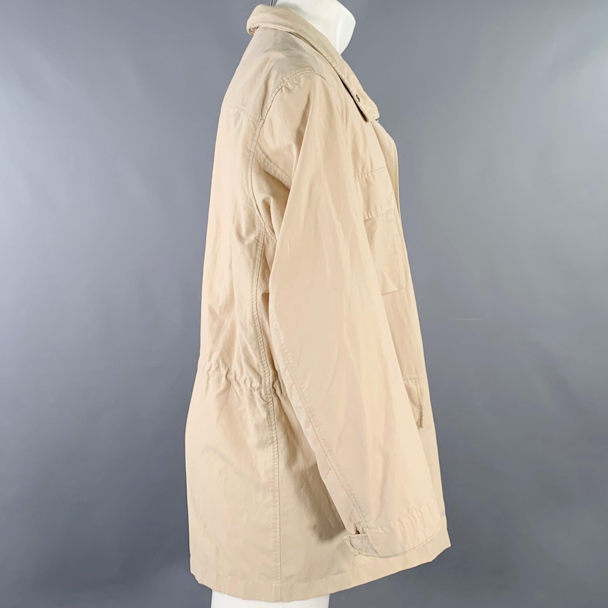 ERMENEGILDO ZEGNA field jacket
in a
cream cotton blend fabric featuring a hidden hood, four snap pockets, and hidden zip & snaps closure. Very Good Pre-Owned Condition. Moderate marks. 

Marked:   M 

Measurements: 
 
Shoulder: 17 inches Chest: 47