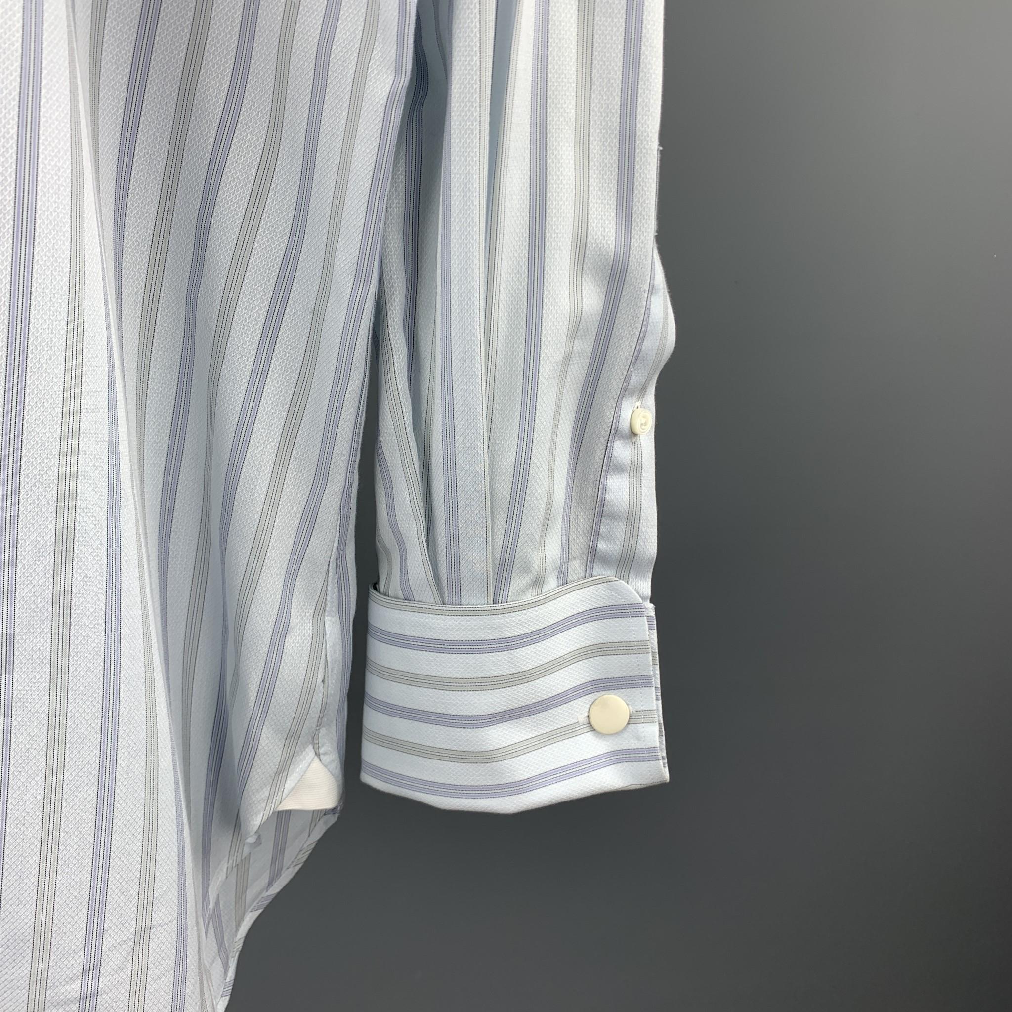 ERMENEGILDO ZEGNA long sleeve shirt comes in a light gray stripe cotton featuring a button up style, french cuffs, and a spread collar. Cufflinks not included. Made in Spain. 

Excellent Pre-Owned Condition.
Marked: 39/15.5

Measurements:

Shoulder: