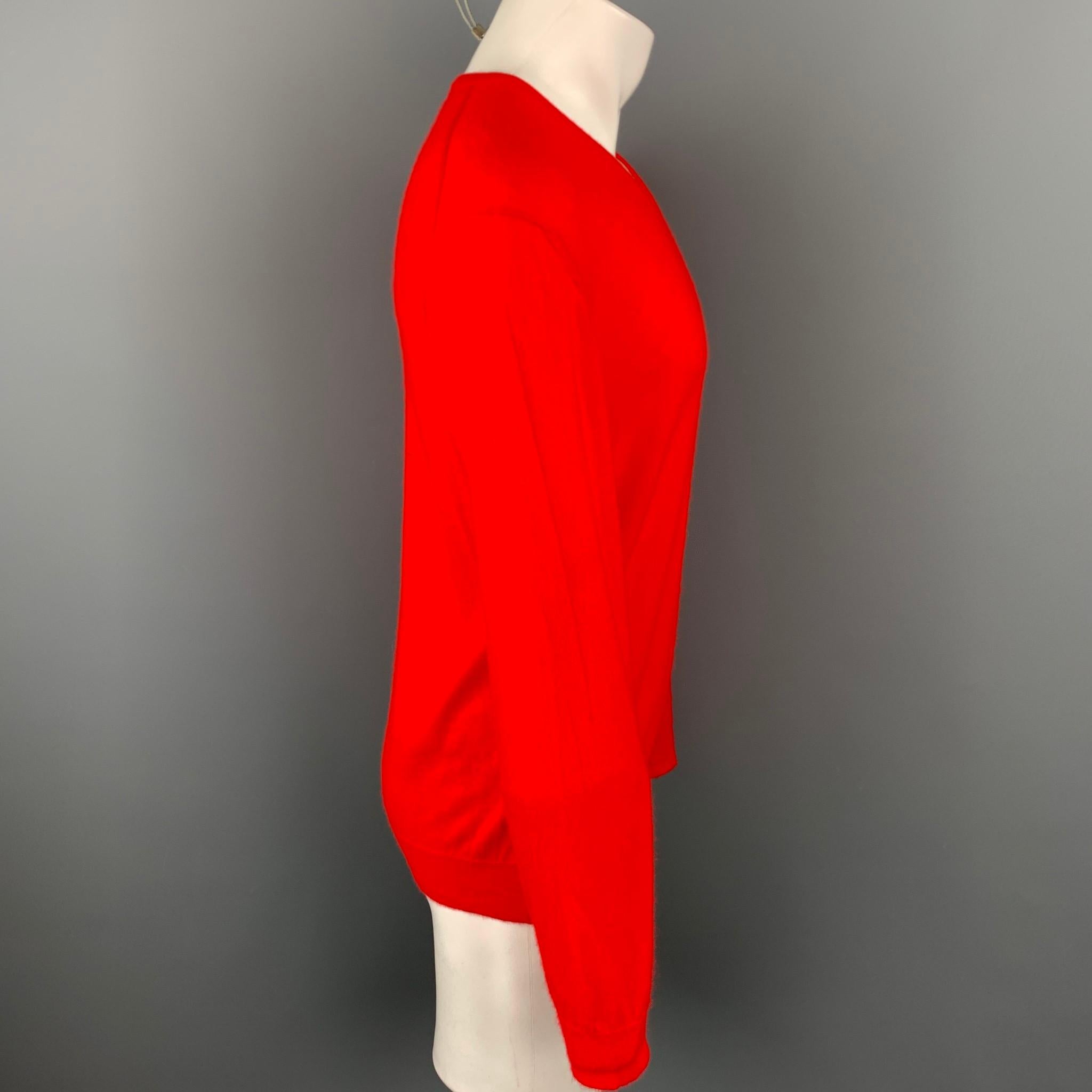 ERMENEGILDO ZEGNA sweater comes in a red cashmere featuring a v-neck. Minor wear. Made in Italy.

Very Good Pre-Owned Condition.
Marked: M/50

Measurements:

Shoulder: 18 in. 
Chest: 42 in. 
Sleeve: 27 in. 
Length: 27 in. 