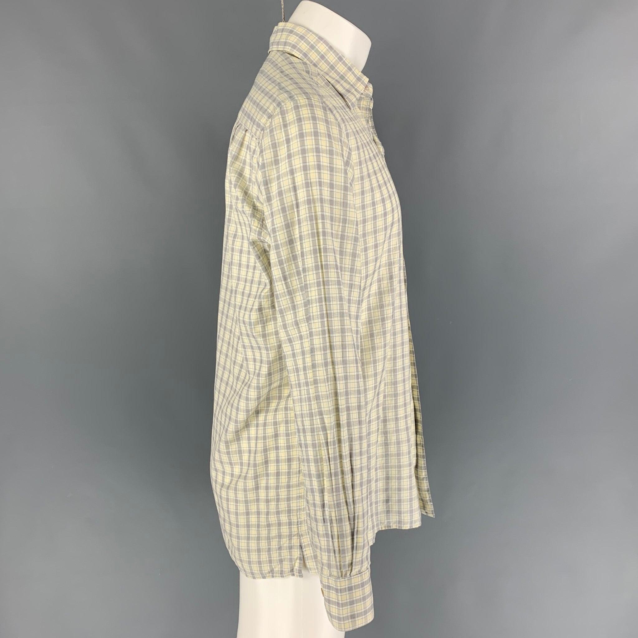 ERMENEGILDO ZEGNA long sleeve shirt comes in a yellow & blue plaid cotton featuring a spread collar and a button up closure.
Very Good
Pre-Owned Condition. 

Marked:   M  

Measurements: 
 
Shoulder: 18 inches  Chest: 42 inches  Sleeve: 26 inches 