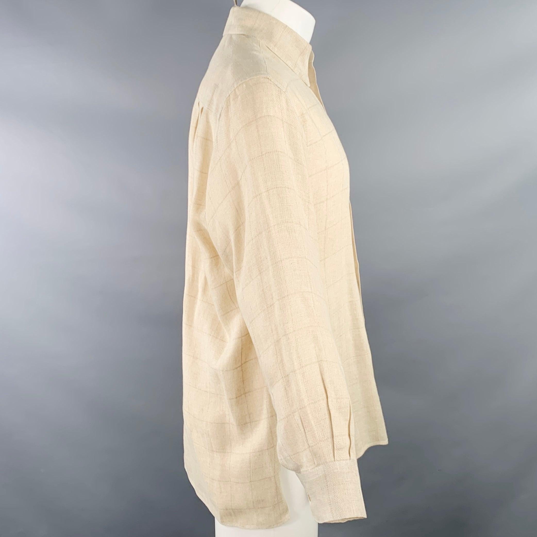 ERMENEGILDO ZEGNA long sleeve shirt
in a beige woven linen featuring a subtle windowpane pattern, hidden button down collar, one pocket, and buton clsoure. Made in Italy.Very Good Pre-Owned Condition. Minor mark on cuff. 

Marked:   S