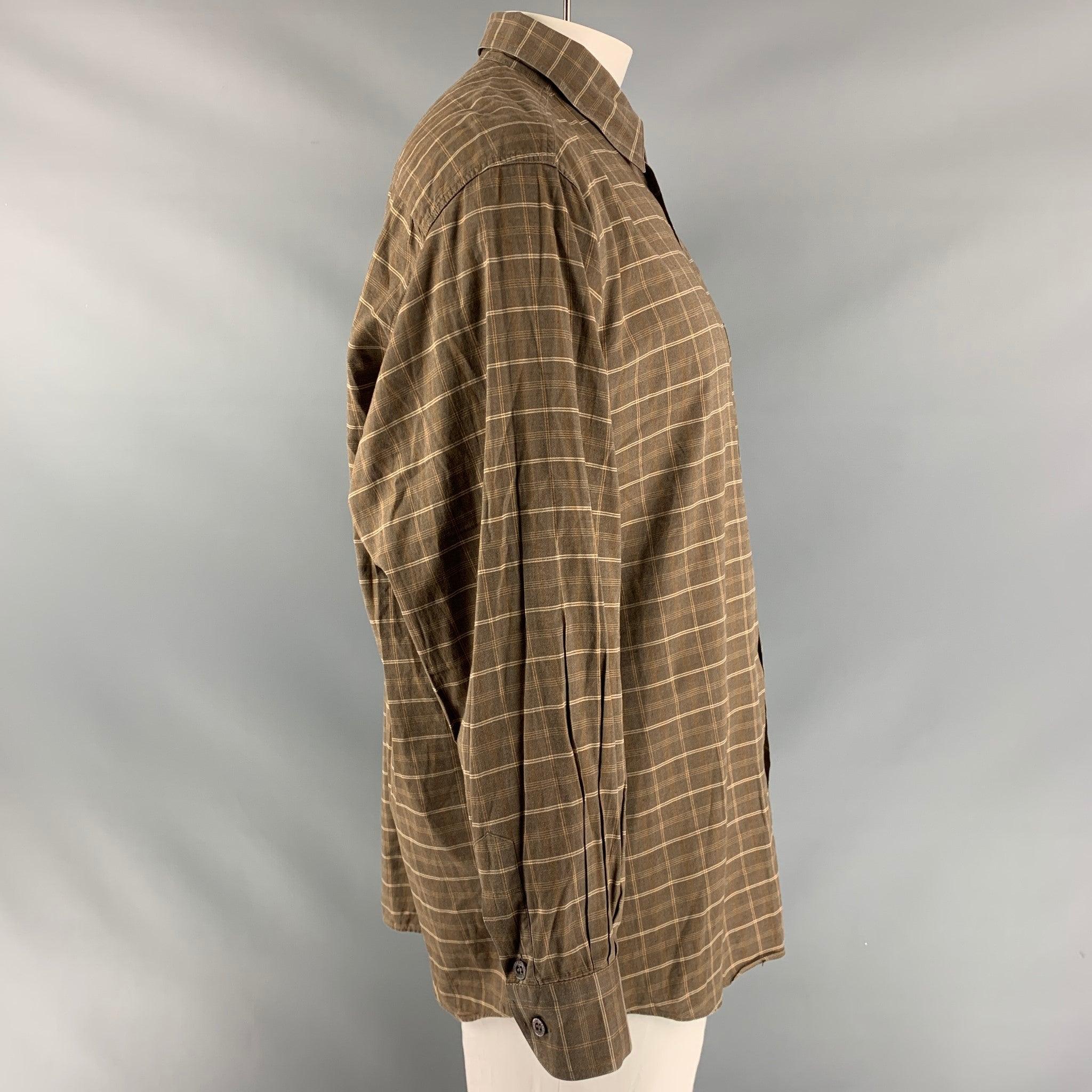 ERMENEGILDO ZEGNA long sleeve shirt comes in brown plaid cotton featuring a patch pocket at left side, straight collar, one button round cuff, and a button up closure. Made in Italy.Excellent Pre-Owned Condition.  

Marked:   XL 

Measurements: 
