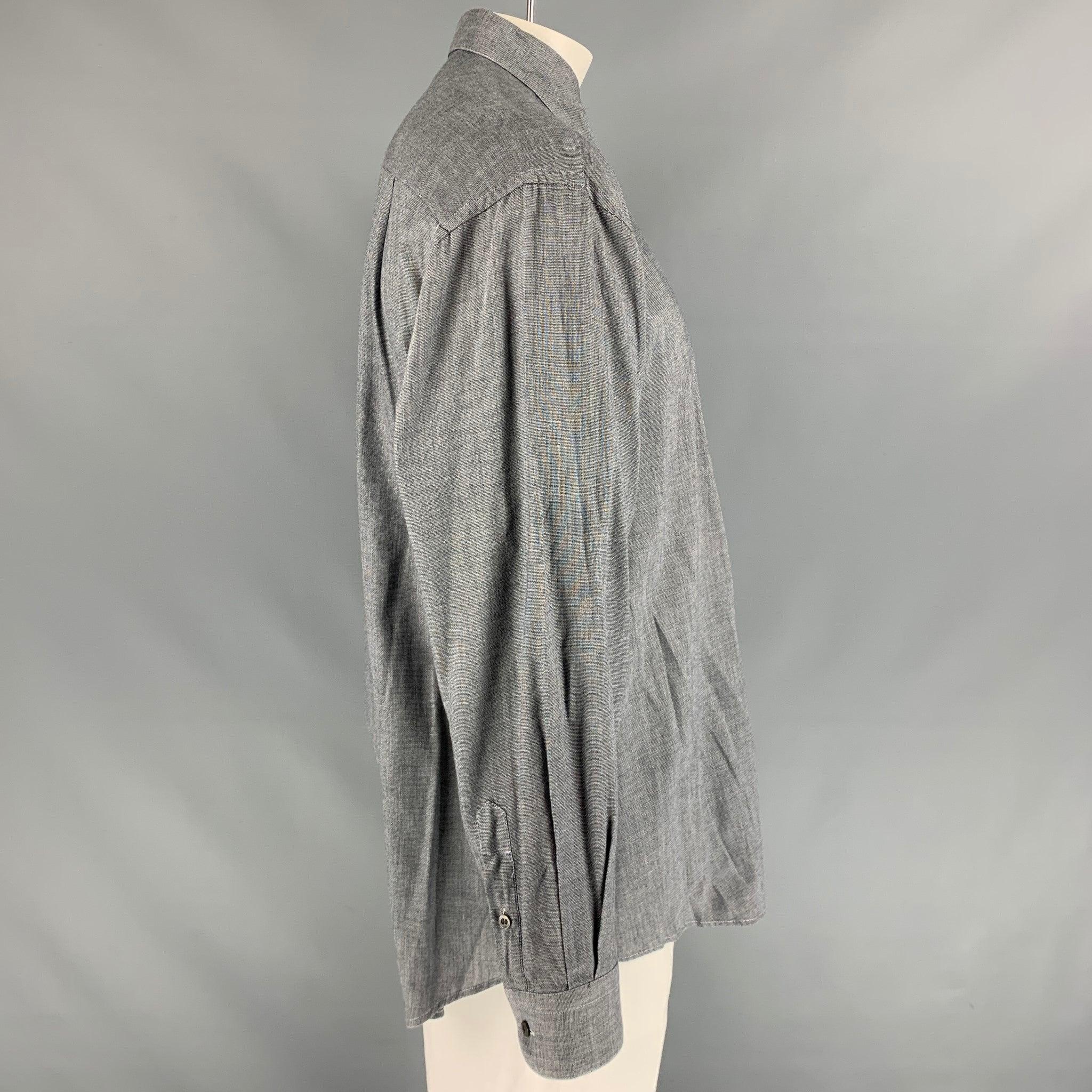 ERMENEGILDO ZEGNA 'SOFT' Long sleeve shirt comes in grey fabric featuring a patch pocket at left front panel, straight collar, one button round cuff, and button up closure. Very Good Pre-Owned Condition. 

Marked:   41/16 

Measurements: 
