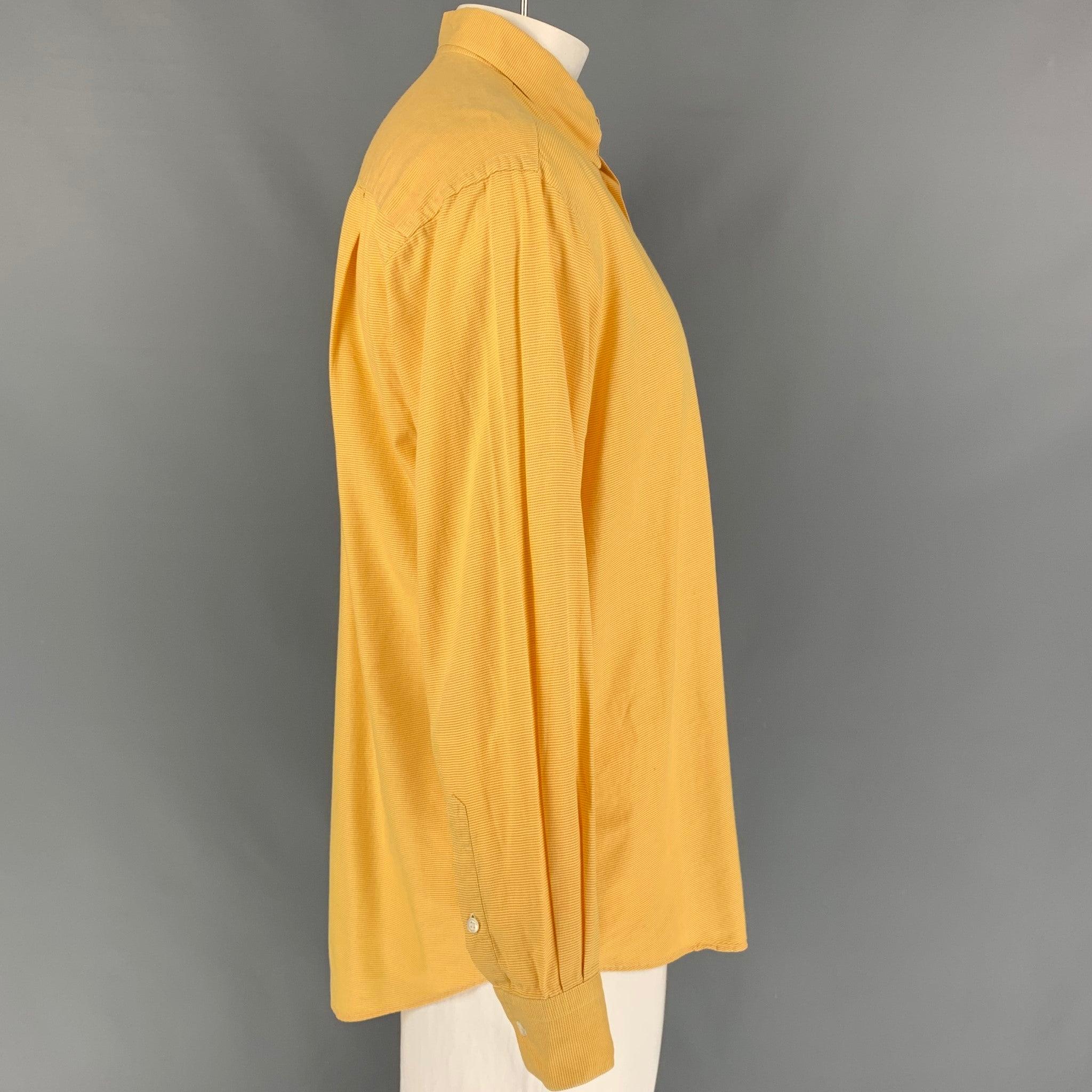ERMENEGILDO ZEGNA 'Soft' long sleeve shirt comes in a yellow nailhead cotton featuring a button down collar, front pocket, and a button up closure.
Very Good
Pre-Owned Condition. 

Marked:   41/16 

Measurements: 
 
Shoulder:
22 inches  Chest: 48