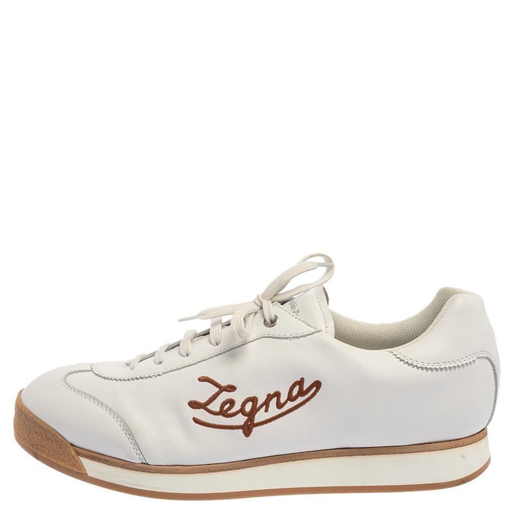Bring home the luxurious chic fashion touch with these Marcello sneakers from Ermenegildo Zegna. Crafted from leather, these white sneakers come flaunting round toes, lace-ups on the vamps, logo signature details on the sides, comfortable insoles,