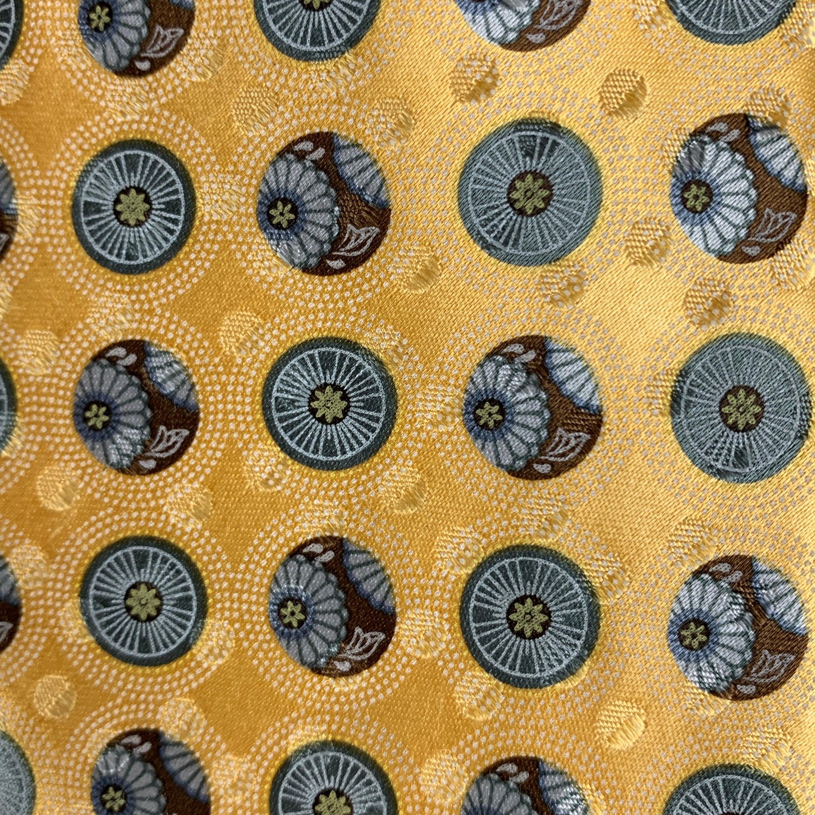 ERMENEGILDO ZEGNA necktie comes in yellow featuring abstract floral circles. 100% silk. Made in Italy.
Very Good Pre-Owned Condition.
 

Measurements: 
  Width: 3 inches Length: 60 inches 




  
  
 
Reference: 124764
Category: Tie
More Details
   