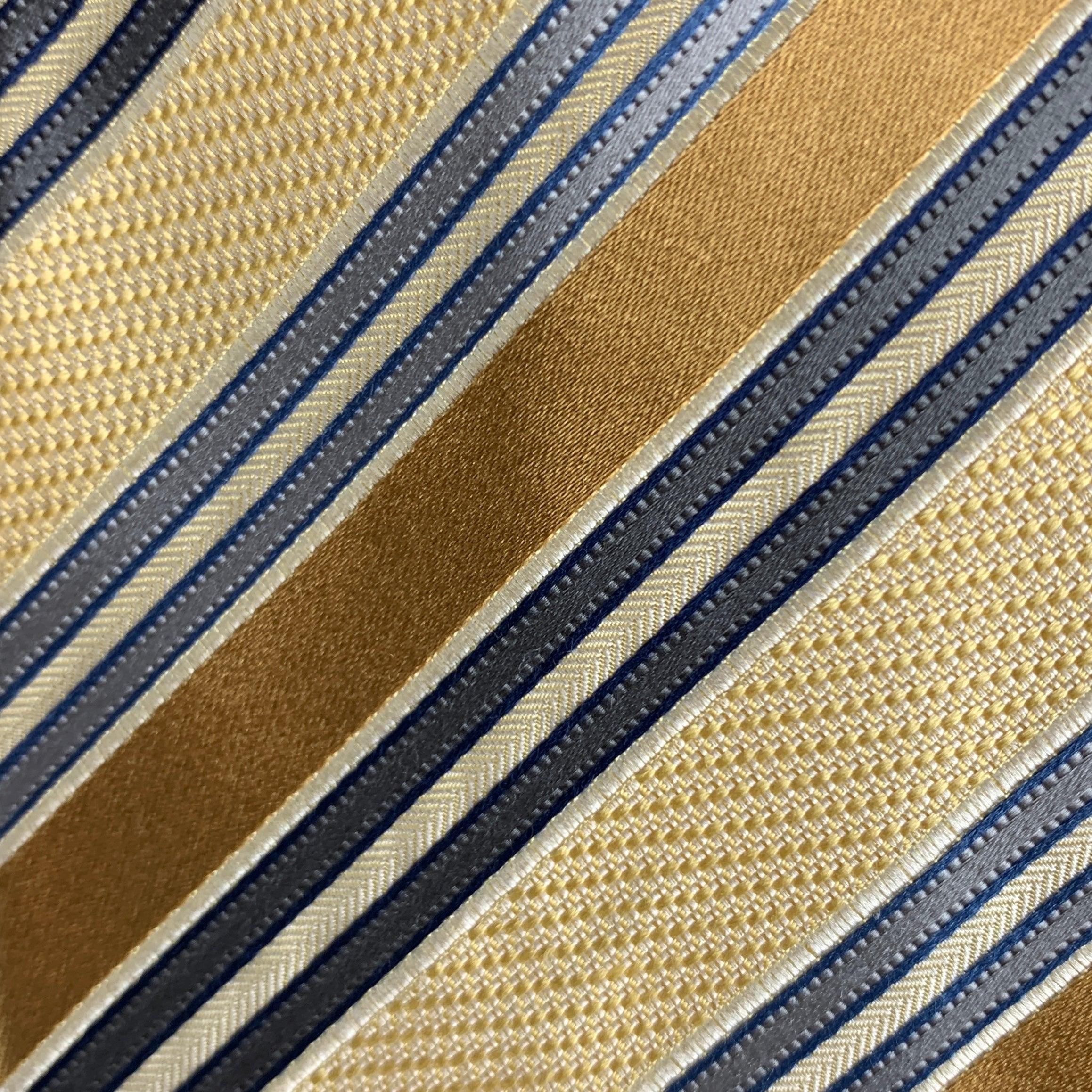 ERMENEGILDO ZEGNA vintage necktie comes in yellow and grey diagonal stripes. 100% silk. Made in Italy.
Very Good Pre-Owned Condition.
 

Measurements: 
  Width: 3 inches Length: 58 inches 




  
  
 
Reference: 124760
Category: Tie
More Details
   