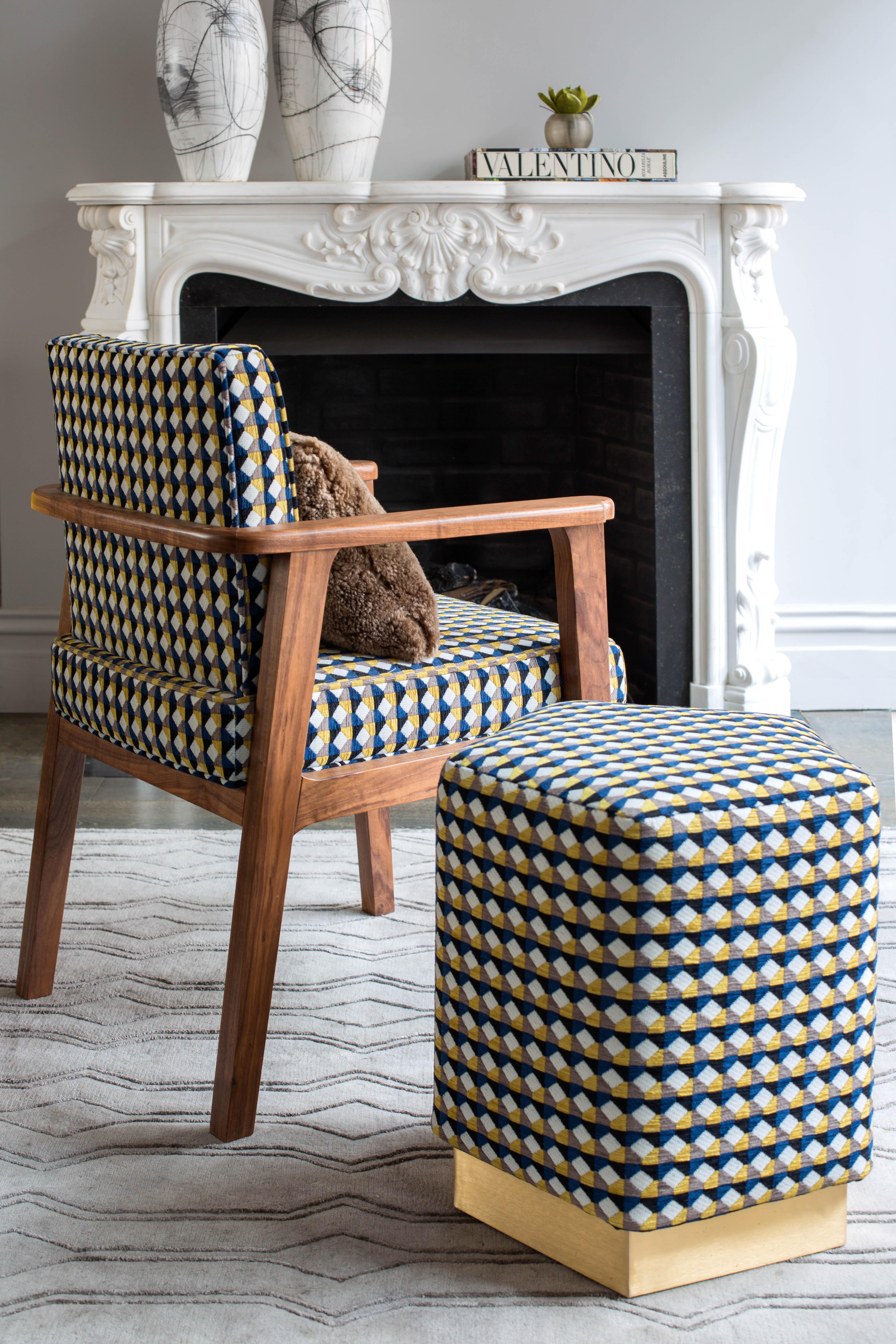 Introducing the Ermes Pouf from Casa Botelho - a funky and functional addition to any room! This pentagon-shaped pouf is a perfect balance of visual intrigue and versatility. Available in a range of colorful and textured fabrics, as well as metallic