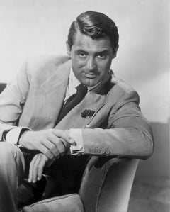 Cary Grant Leaning and Smiling in the Studio Movie Star News Fine Art Print