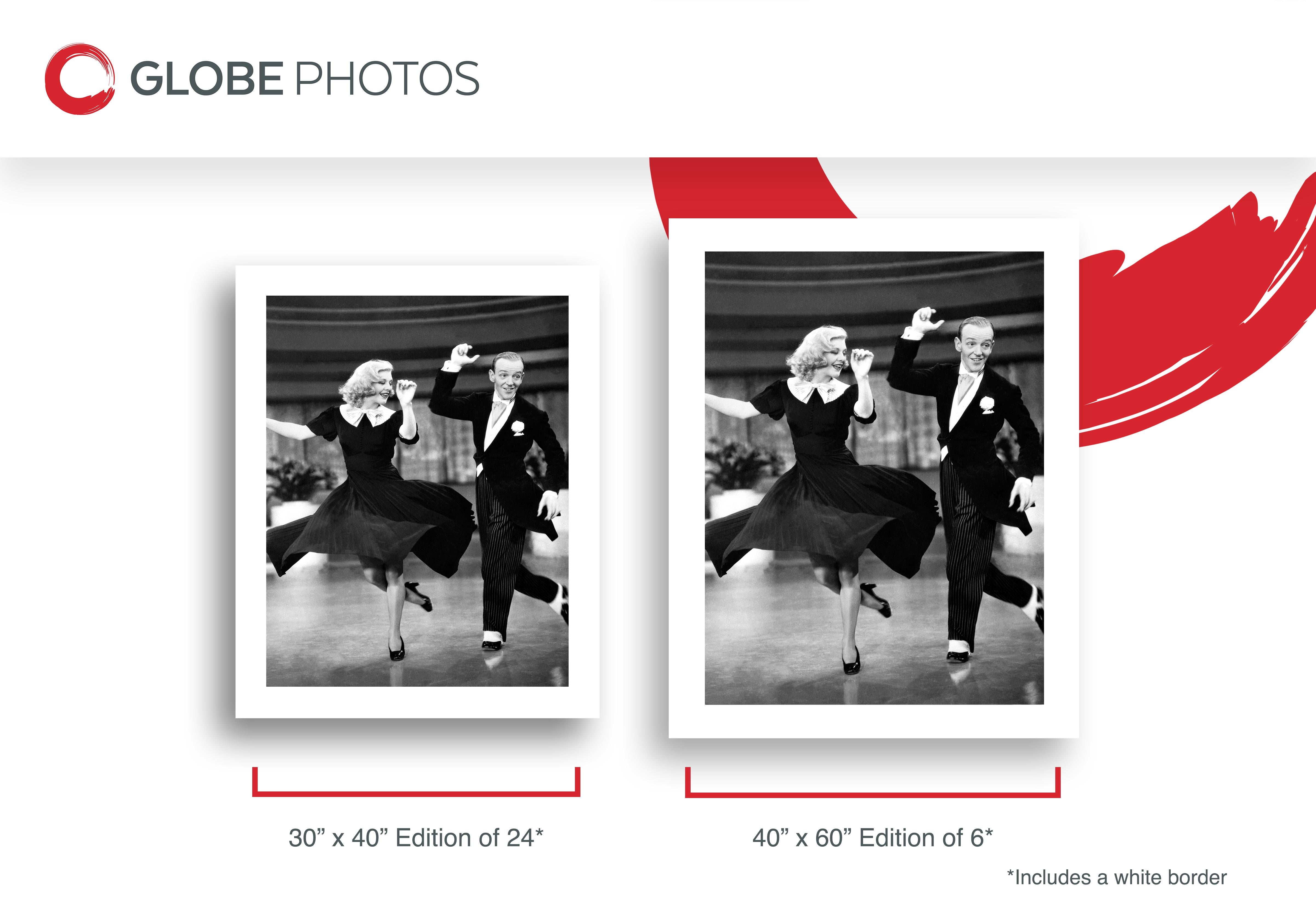 This black and white action shot features Ginger Rogers and Fred Astaire dancing for their roles in 