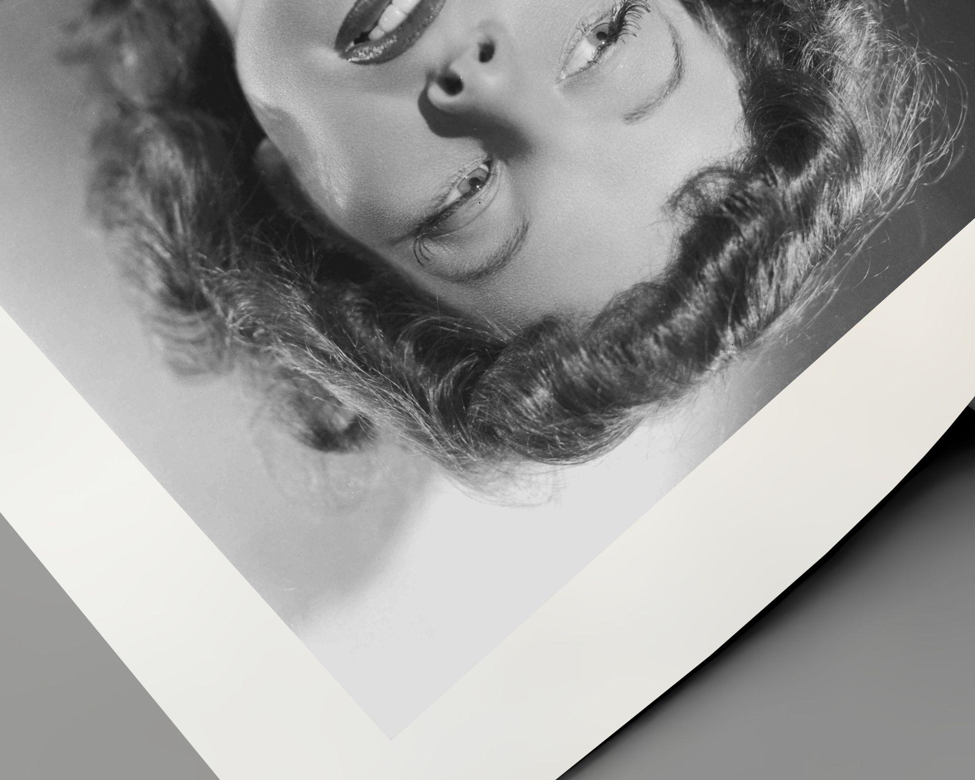 Katharine Hepburn in Coat - Contemporary Photograph by Ernest Bachrach
