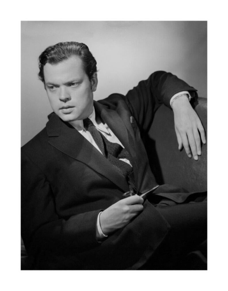 Ernest Bachrach Black and White Photograph - Orson Welles Leaning in the Studio