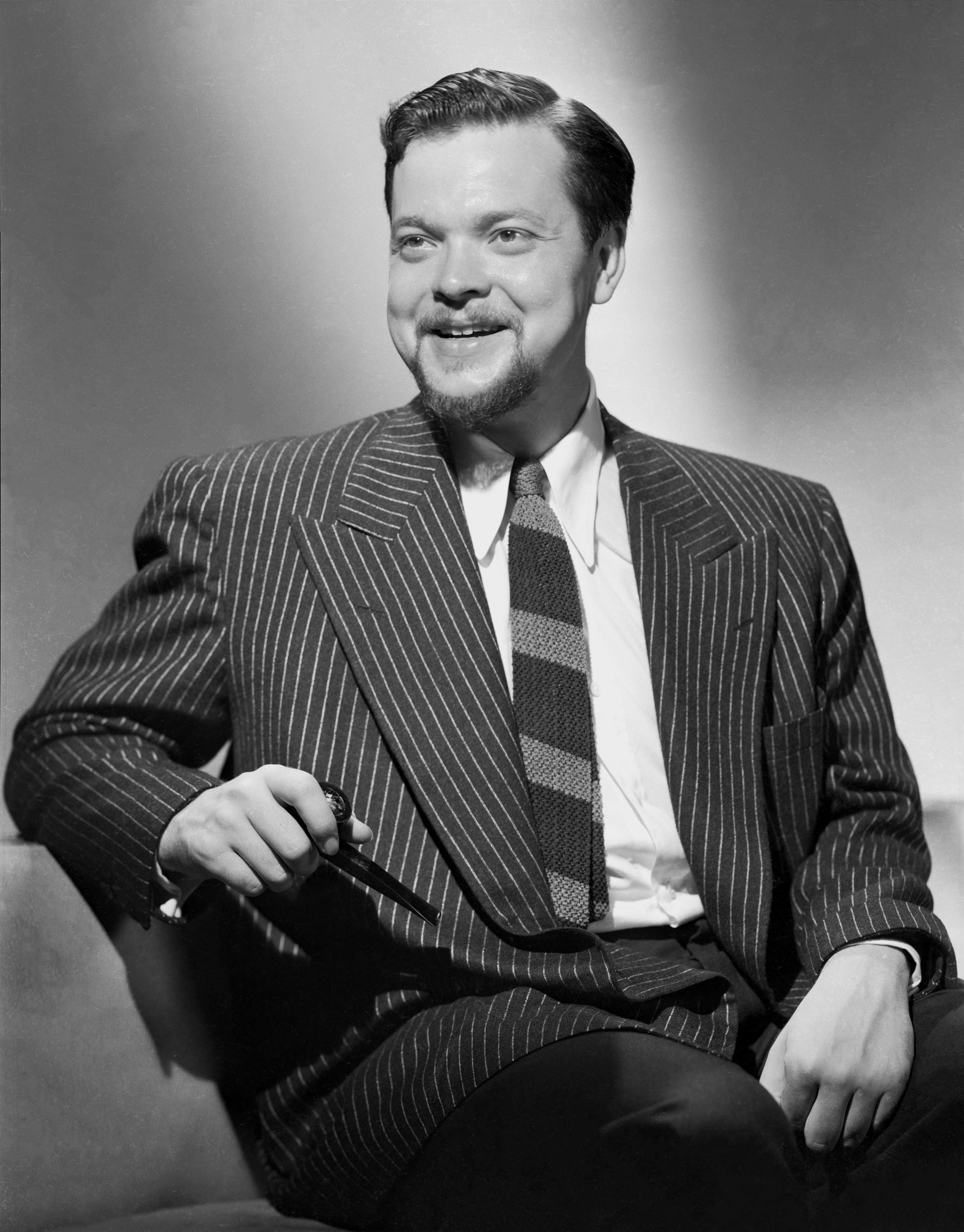 Ernest Bachrach Black and White Photograph - Orson Welles Posed with Big Smile in the Studio Movie Star News Fine Art Print