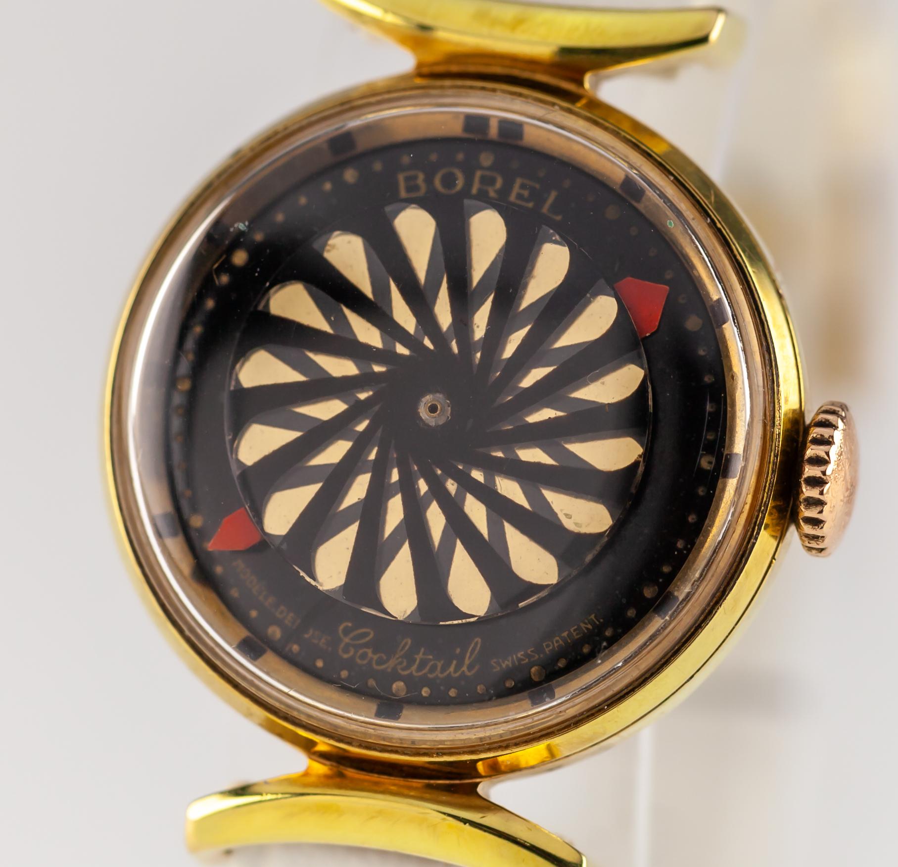 
Ernest Borel Gold-Plated Women's Kaleidoscope Watch w/ New White Leather Band
Case #Borel 26
Gold-Plated Round Case
25 mm in Diameter (27 mm w/ Crown)
Lug-to-Lug Distance = 32 mm
Lug-to-Lug Width = 13 mm
Thickness = 10 mm
Black Kaleidoscope Dial w/