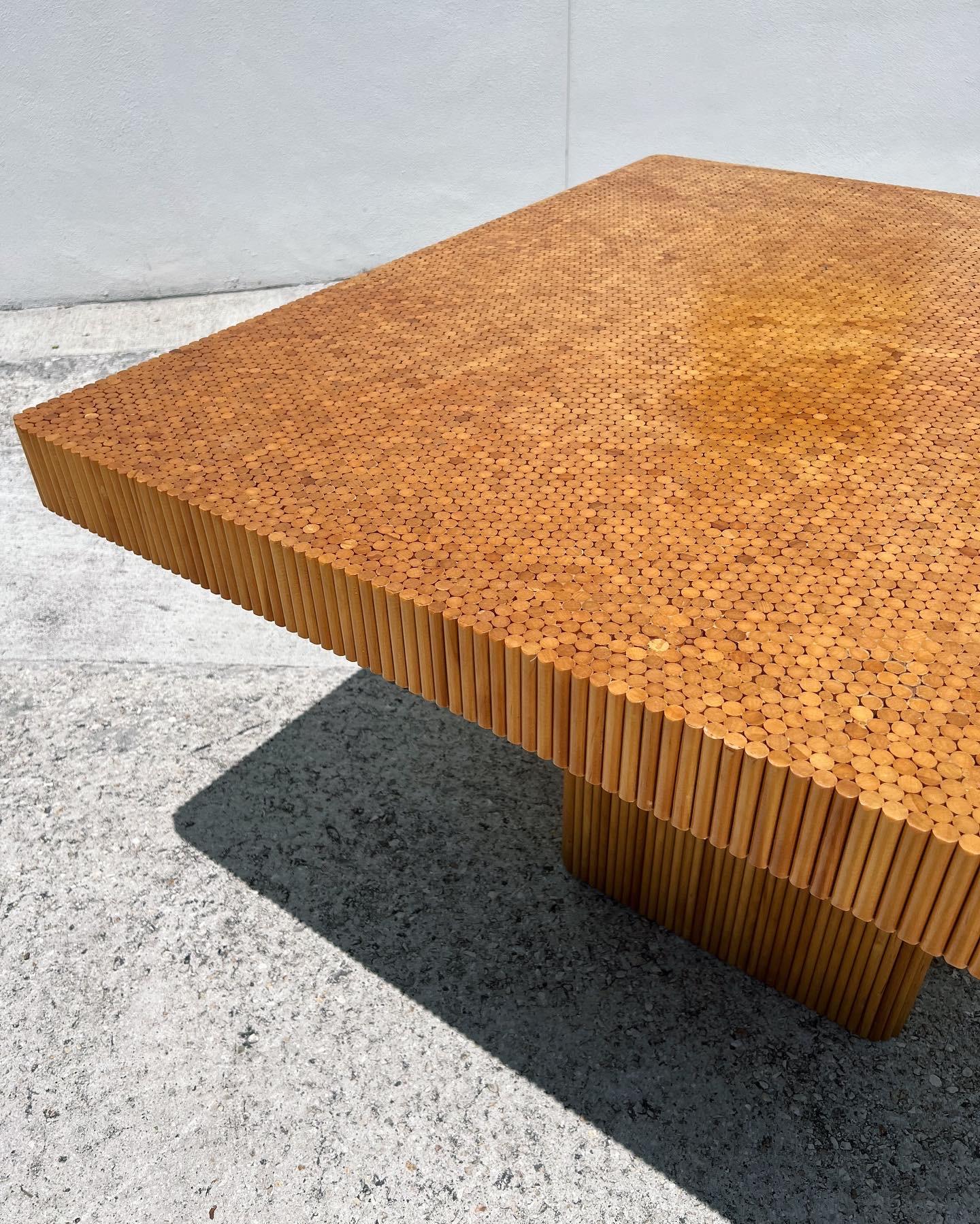 An Incredible dining table by American artist Ernest C. Masi hand crafted in the 1970’s. The table is comprised of individually placed maple dowels giving it a unique and organic aesthetic which can be seeing throughout the top. His doweled pieces