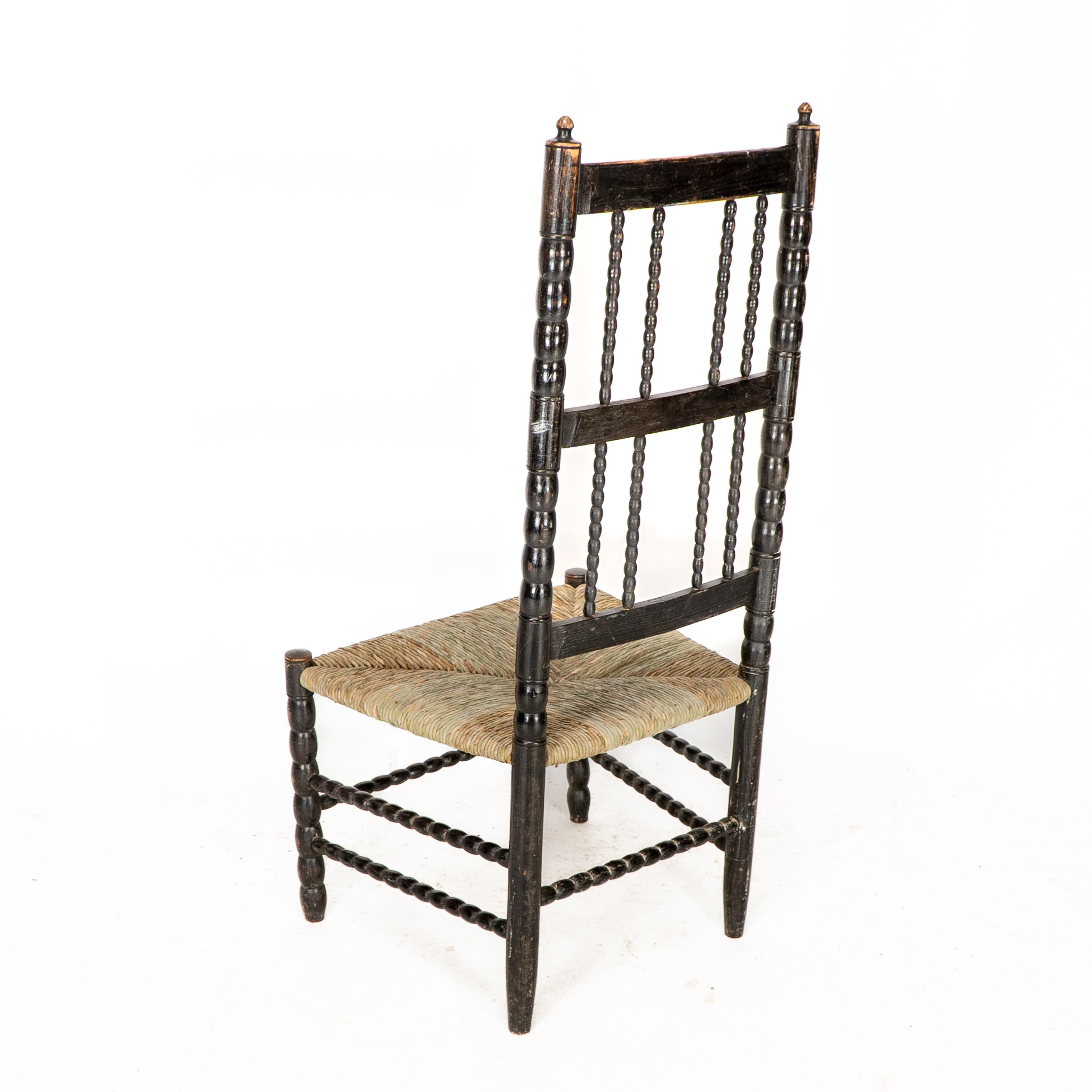 Ernest Gimson. Rare fauteuil bas de l'école Cotswold en bois d'ébène tourné en bobbin en vente 8