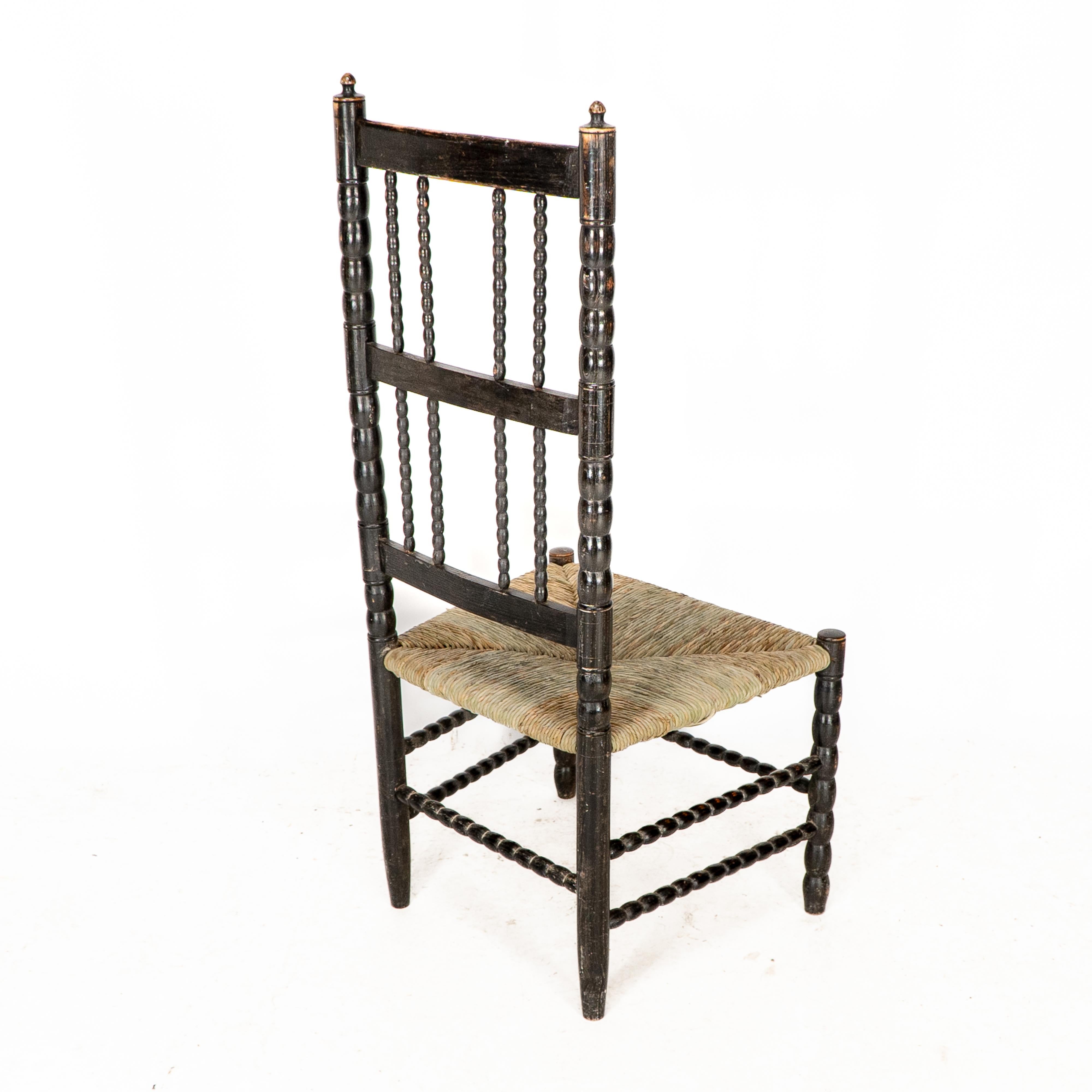 Ernest Gimson. Rare fauteuil bas de l'école Cotswold en bois d'ébène tourné en bobbin en vente 10