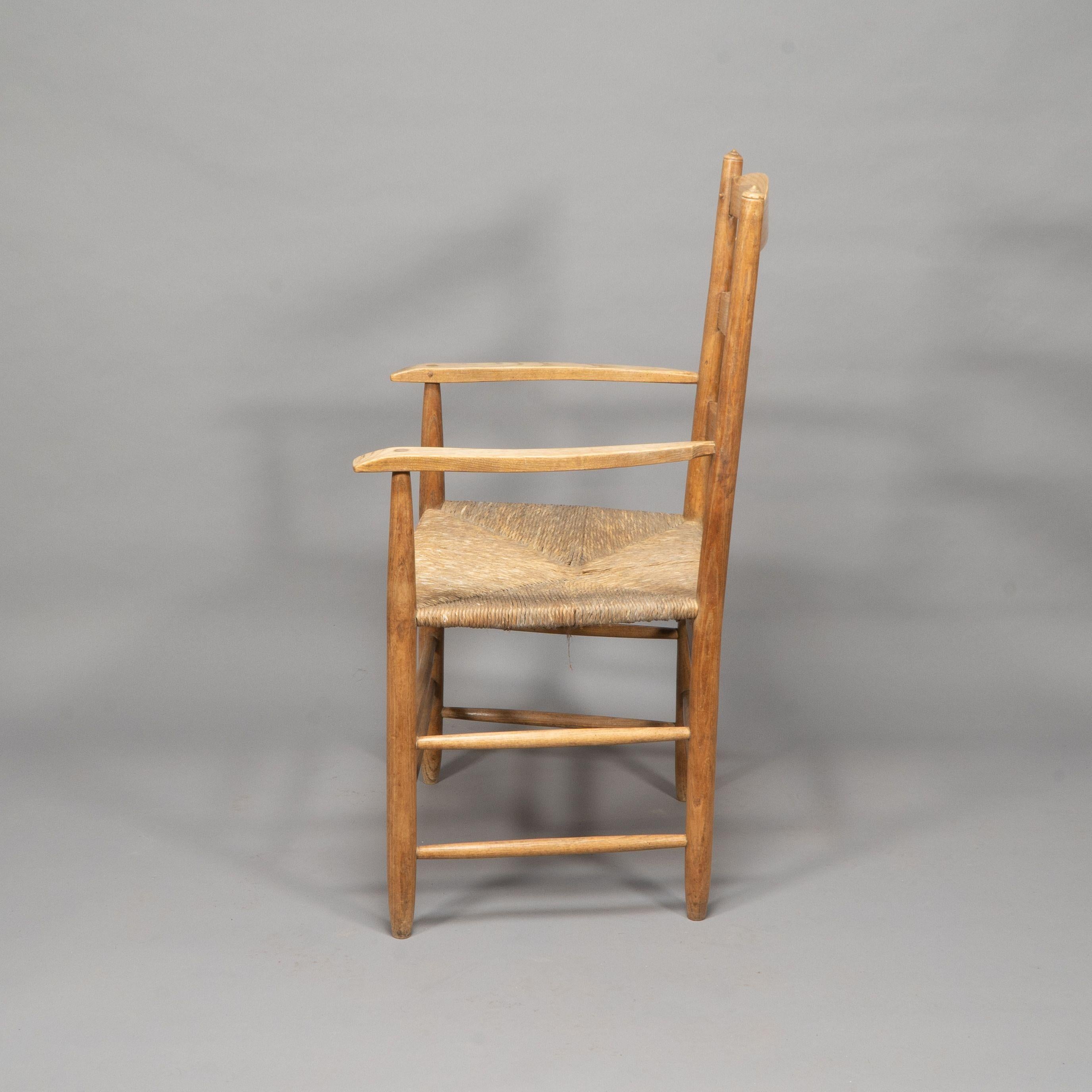 British Ernest Gimson by Edward Gardiner. Arts & Crafts ash ladder back Bedales armchair