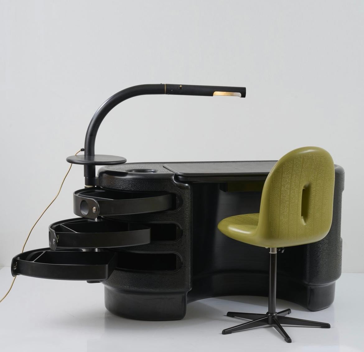 Ernest Igl for Bayer AG, 'Hadi' desk, set including adjustable chair and lamp, polyurethane, Germany, 1970s 

This design by Ernest Igl truly resembles the ethos of the seventies, featuring the commonly used material of that time: polyurethane.