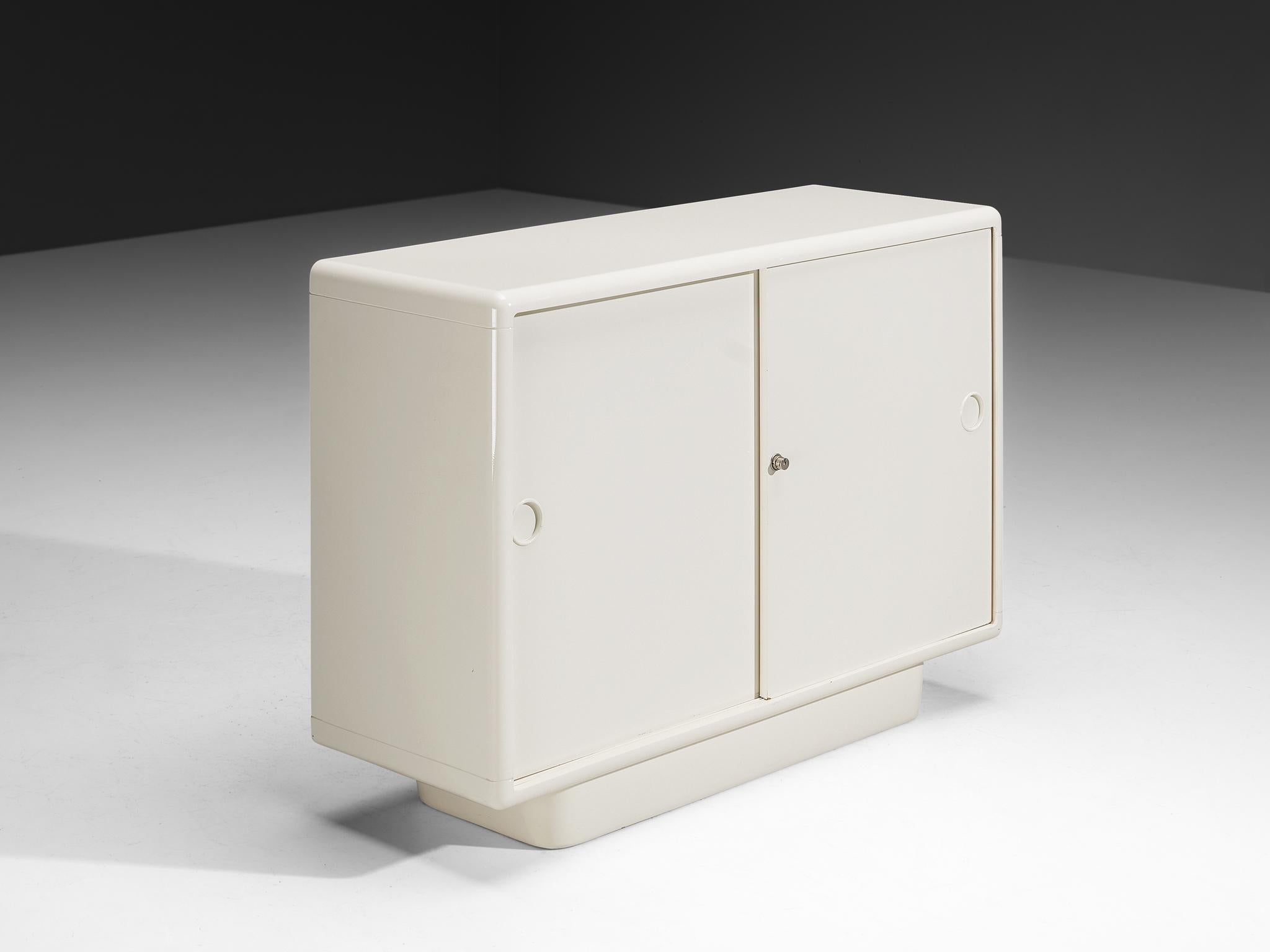 Ernest Igl for Wilhelm Werndl, sideboard, polyurethane, Germany, 1970/71

Ernest Hofmann, also known by his artist name 'Igl', recently gained an international audience for his design work. An orange-colored version of a desk furnished the MIB