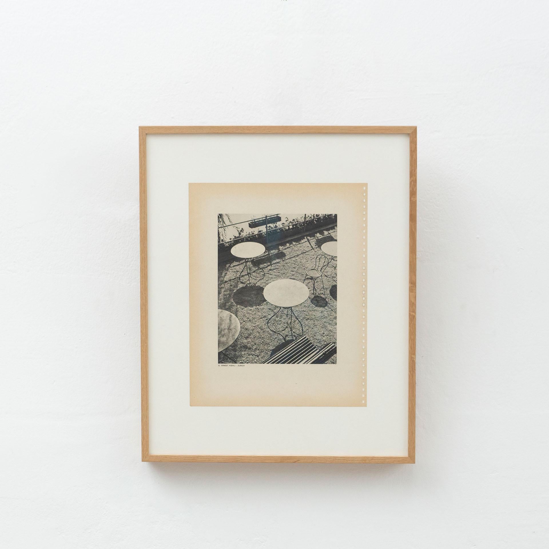 Vintage photo gravure 'Picnic Tables' by the photographer Ernest Koehli.
Wood frame with passepartout and high quality museum's glass.

In original condition, with minor wear consistent with age and use, preserving a beautiful patina.