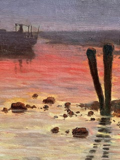 19th century English fisherman out fishing at sunset or sunrise, with boat