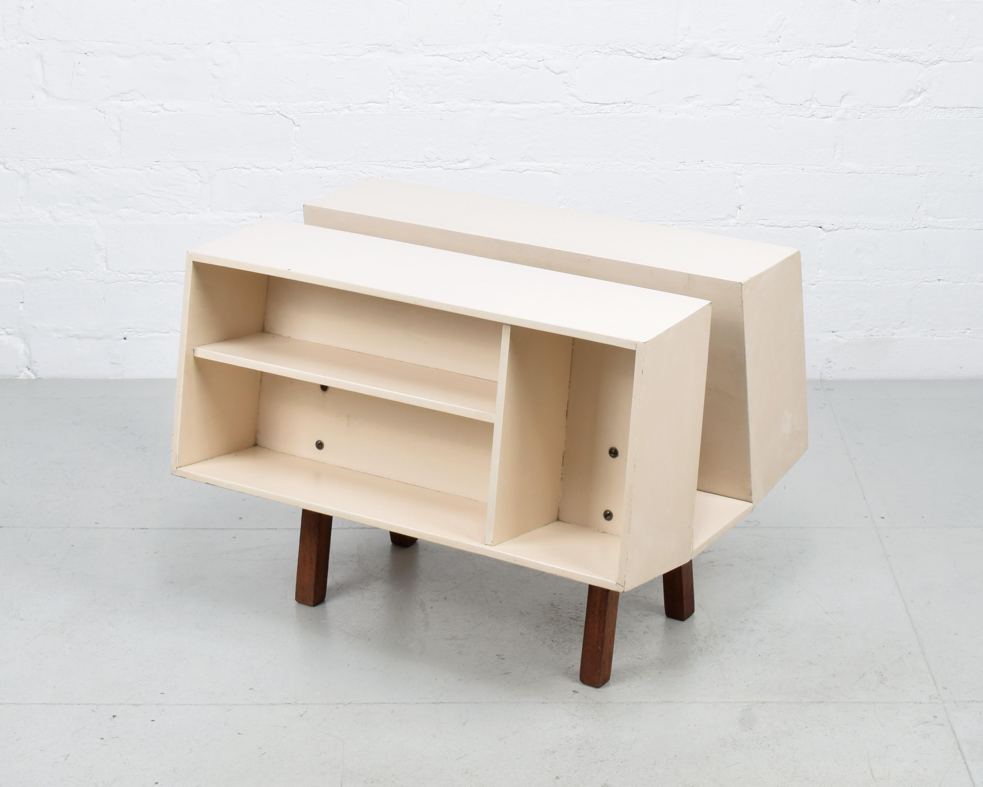 Ernest Race, UK.

Isokon Donkey Mark 2

Designed 1963 for the Isokon Furniture Company.

Cream-white painted plywood with wooden legs.

L 53 cm, W 41 cm, H 40 cm; Wt 5.2 kg

Originally supplied flat-packed, the donkey was sold as a mail order item.