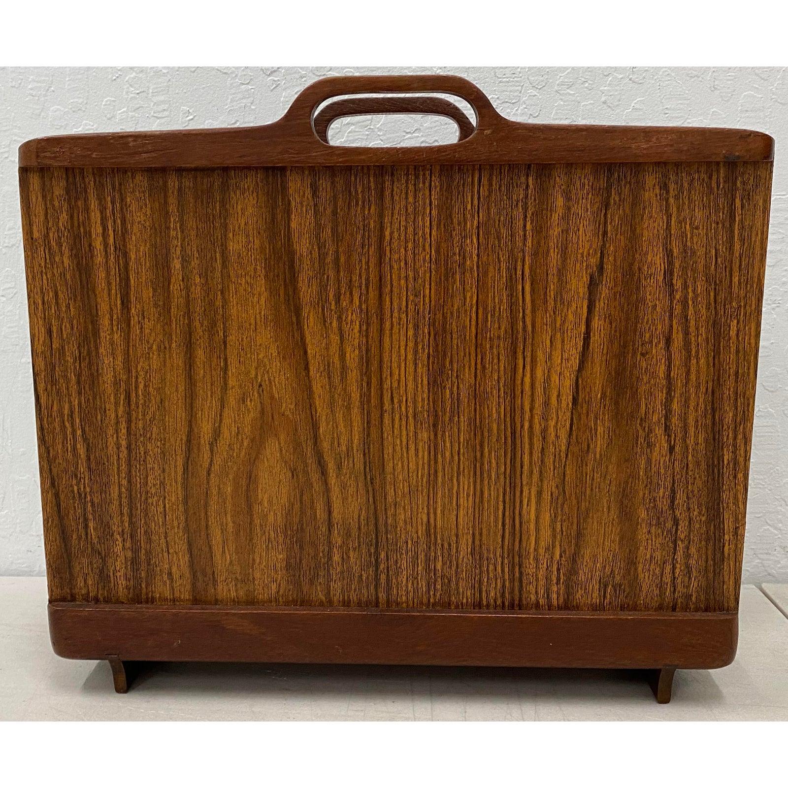 Ernest Sohn Siamese teak magazine holder, circa 1960s

Measures: 16