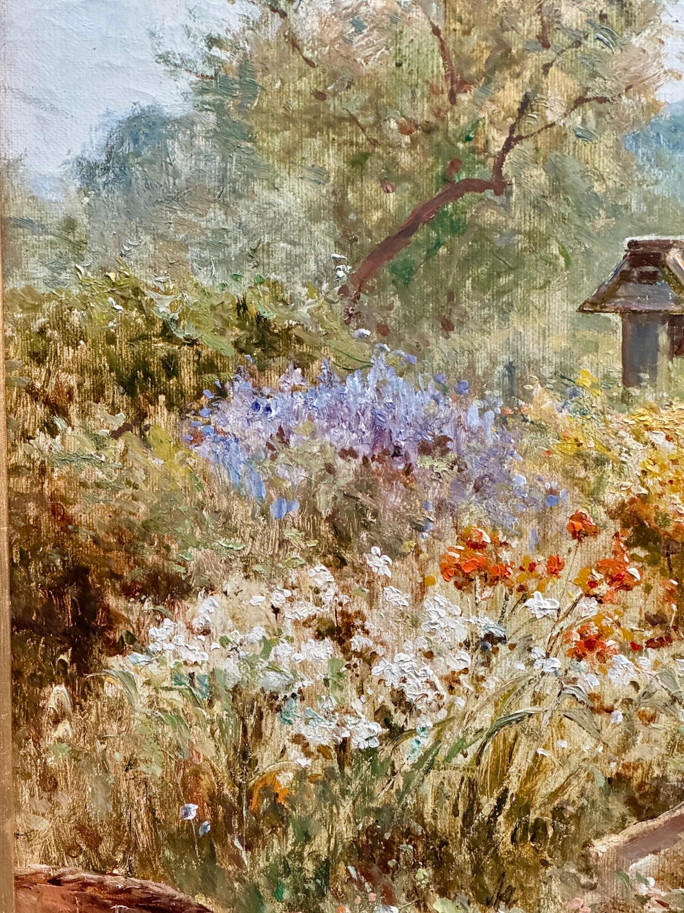 Casa de campo inglesa victoriana de principios del siglo XX Jardín con mujer con flores en venta 4