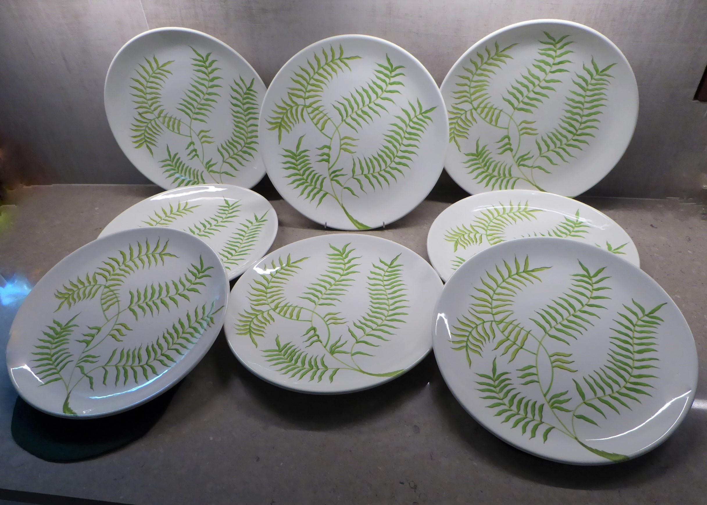 Eight bright and cheerful Mid-Century Modern large dinner or serving platters by Ceramiche Ernestine from Salerno in Northern Italy from the 1960s. Ernestine designed all patterns and shapes for her company, this simple Fern pattern of these