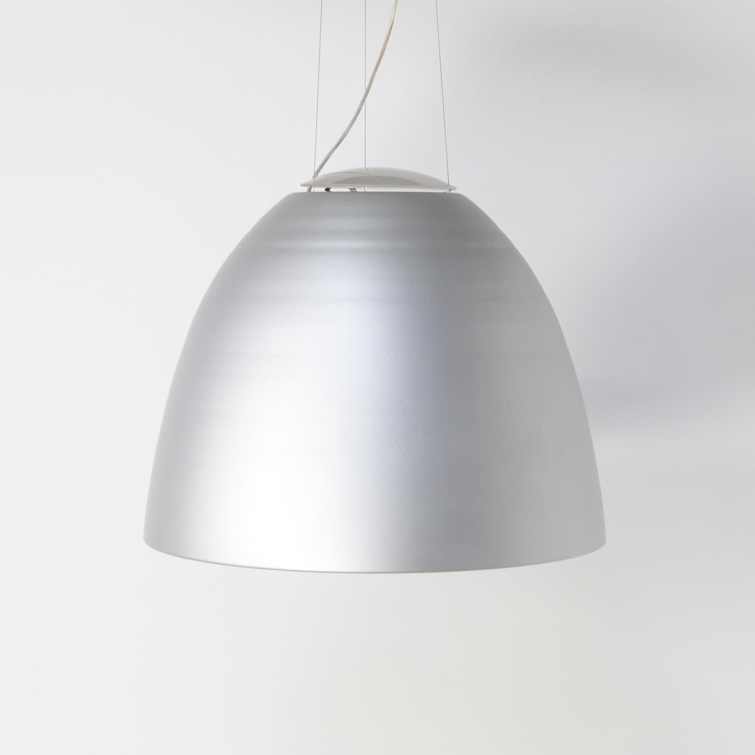 Nur hanging lamp is a design by Ernesto Gismondi and manufactured by Artemide. The hanging lamp provides light in a stylish way. It not only shines light downwards but also light upwards, which creates a kind of circle on the ceiling. Mood lighting,