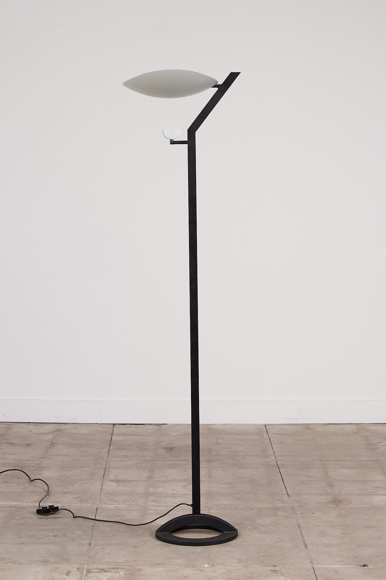 Ernesto Gismondi “Zen” floor lamp for Artemide, Italy, c.1980s. The anodized aluminum lamp features two light sources, one at top that rests in a large cream colored saucer shade and reflects light upward. The second, beneath which reflects light