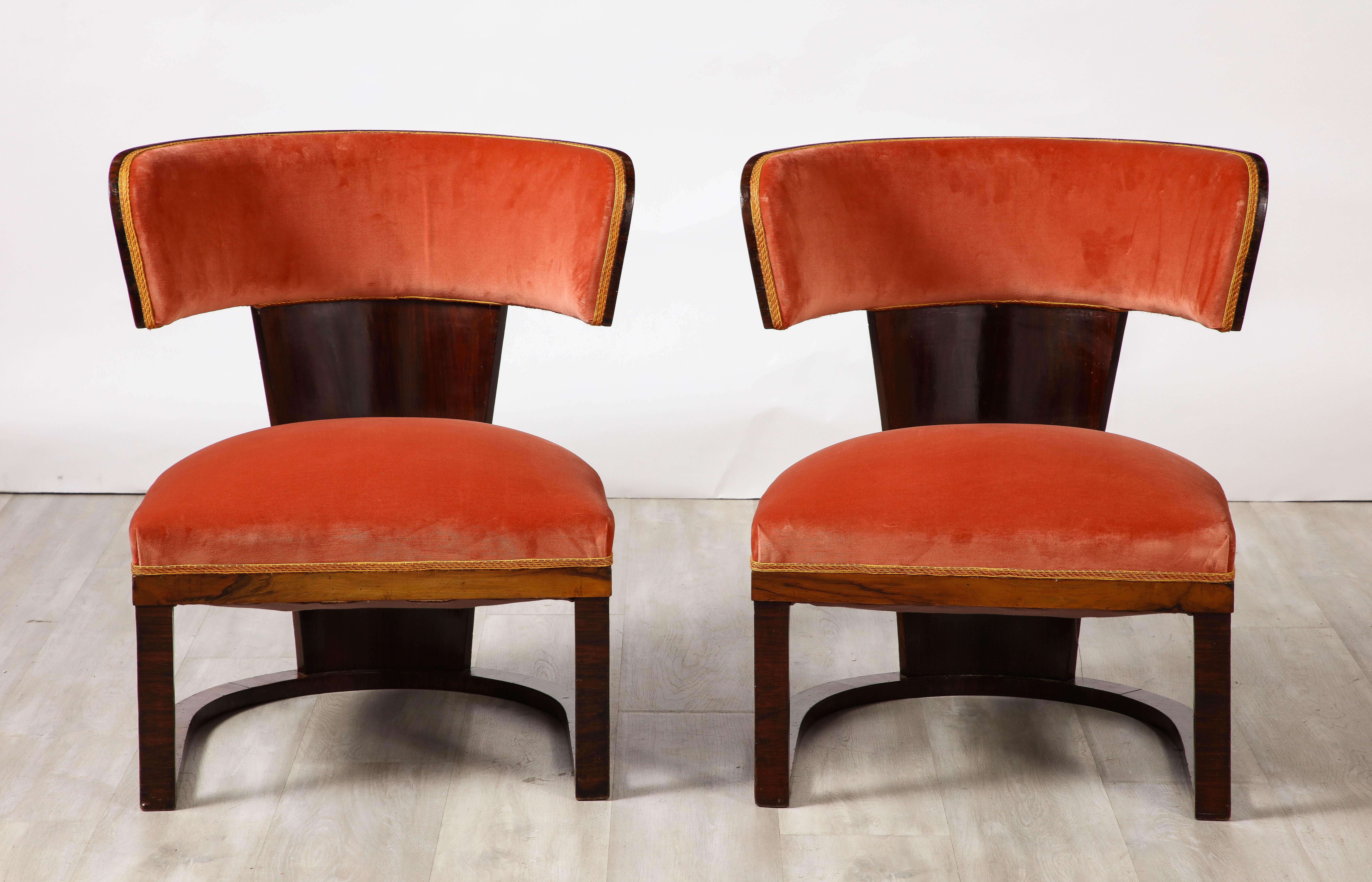 A rare pair of side /slipper chairs designed by Ernesto La Padula from the Italian Art Deco period, circa 1930.  The design can also be described as being  from the Italian Rationalist period (an architectural current that developed in Italy in the
